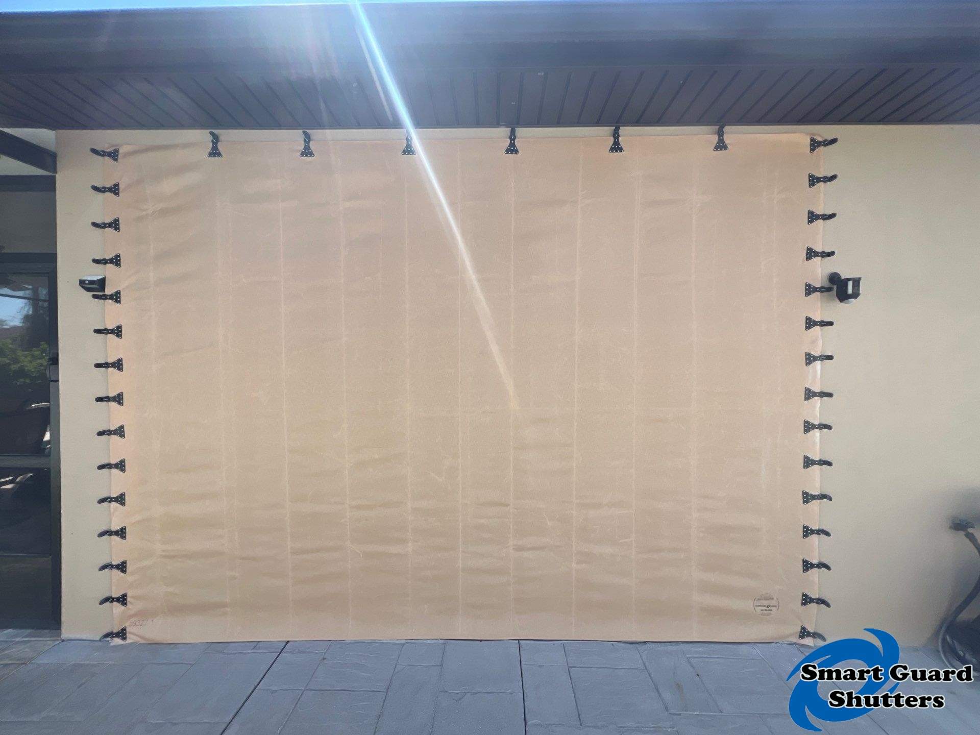 Hurricane Protection in Tan / Ivory by Smart Guard Shutters
