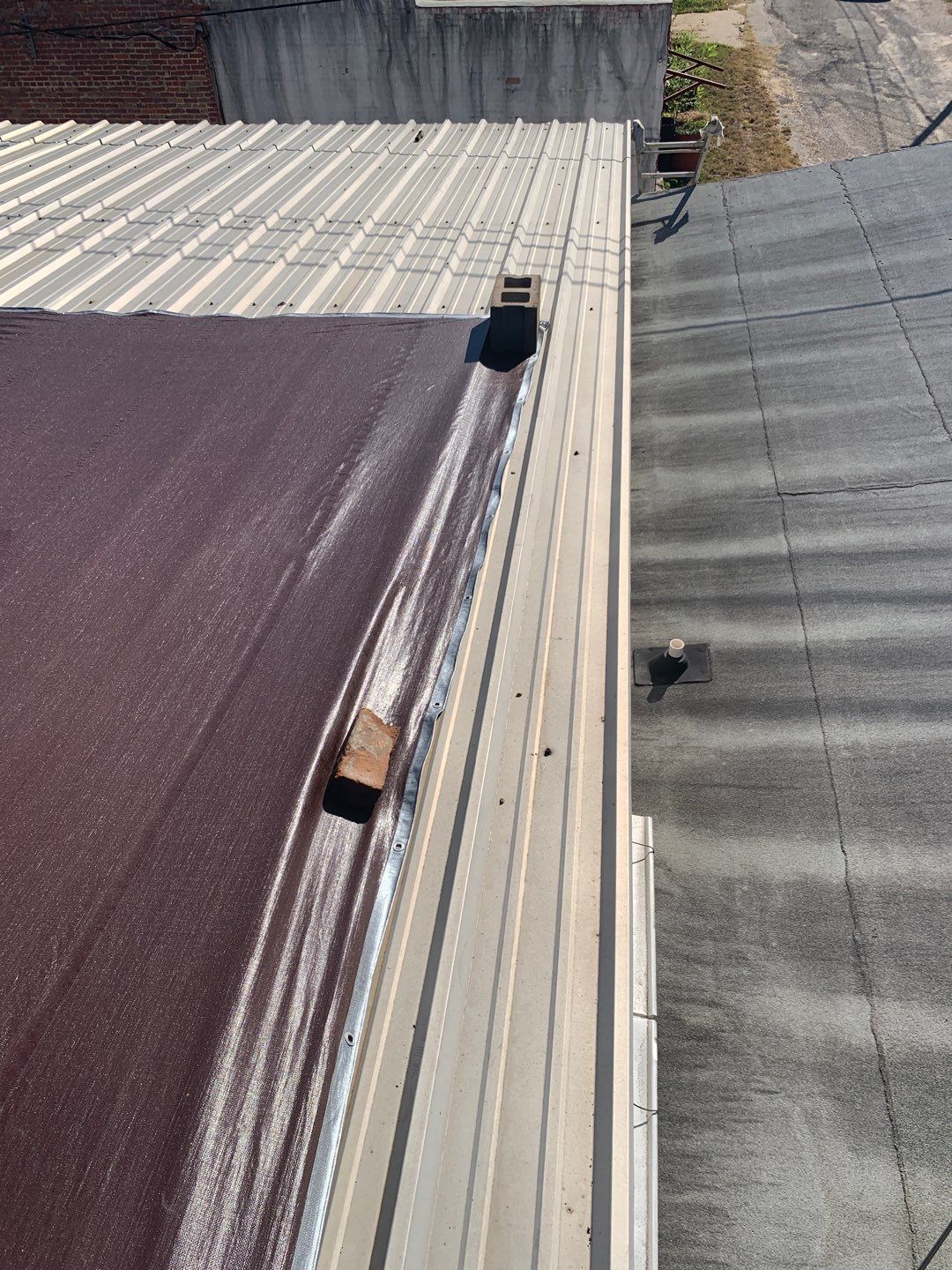 Downtown Gladewater Commercial Foam Roof Restoration – SPF + High-Tensile Acrylic by All Star Roofing LLC