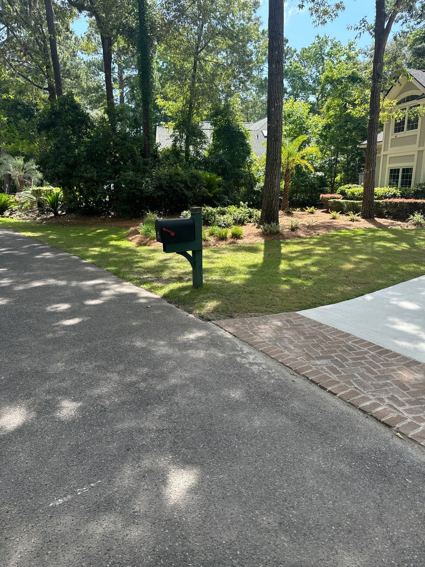 Hilton Head Island Concrete Driveway Replacement with Herringbone Brick Inlays by Lowcountry Scapes, LLC
