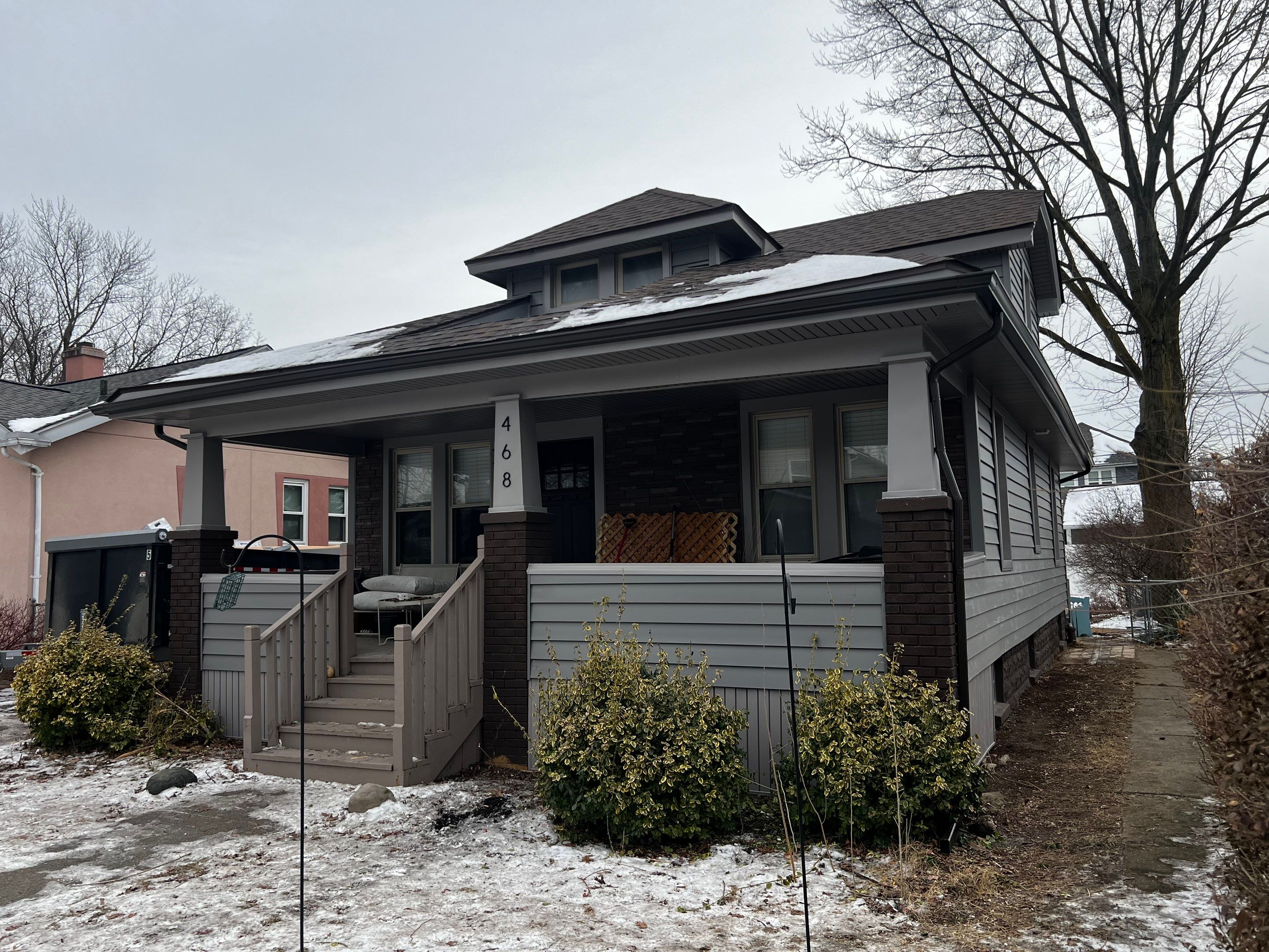 Vinyl Siding Replacement by Bloomfield Construction & Restoration