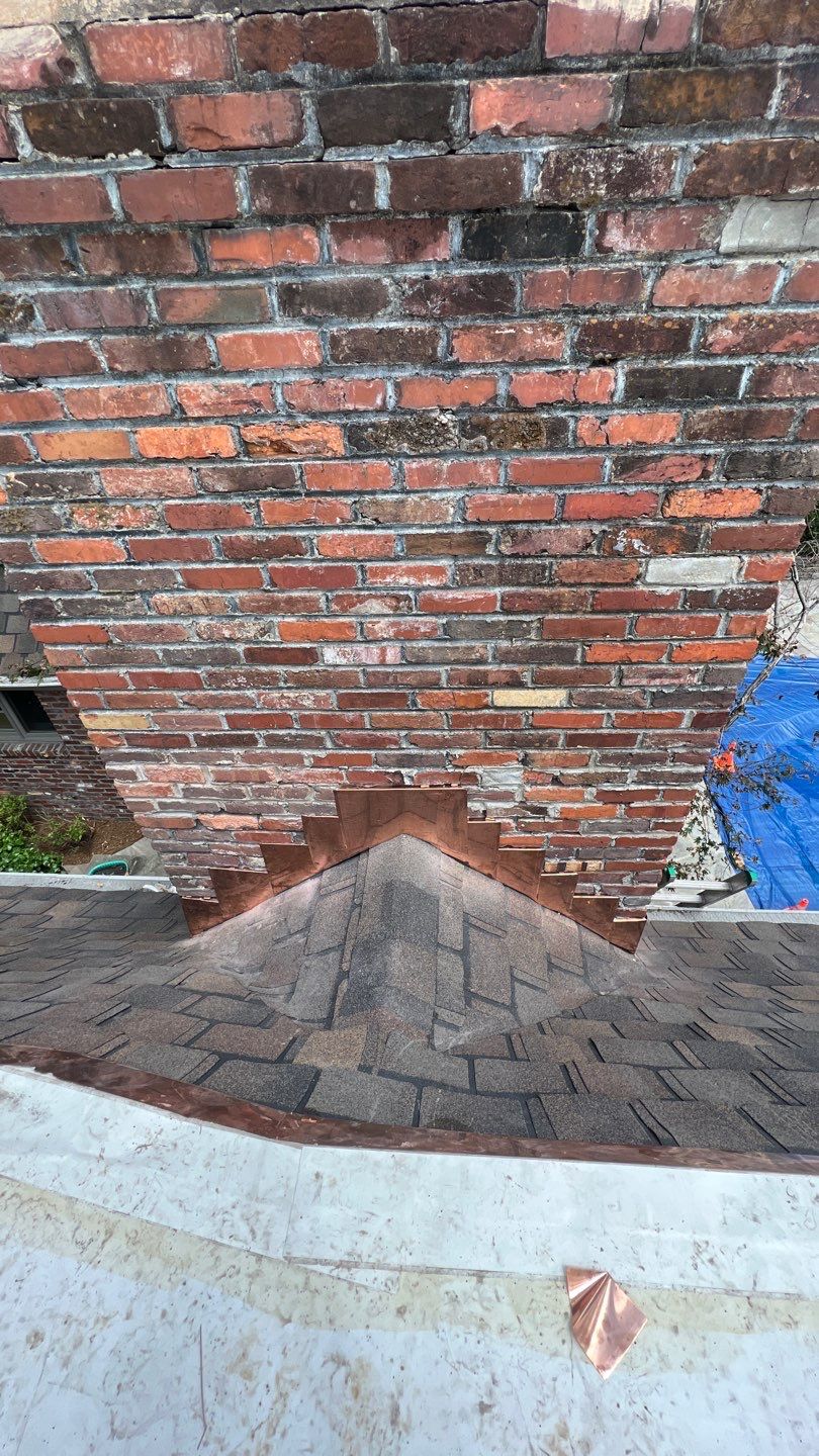 Residential Roofing Installation using Certainteed Belmont Shingles and TPO by Undersun Roofing 