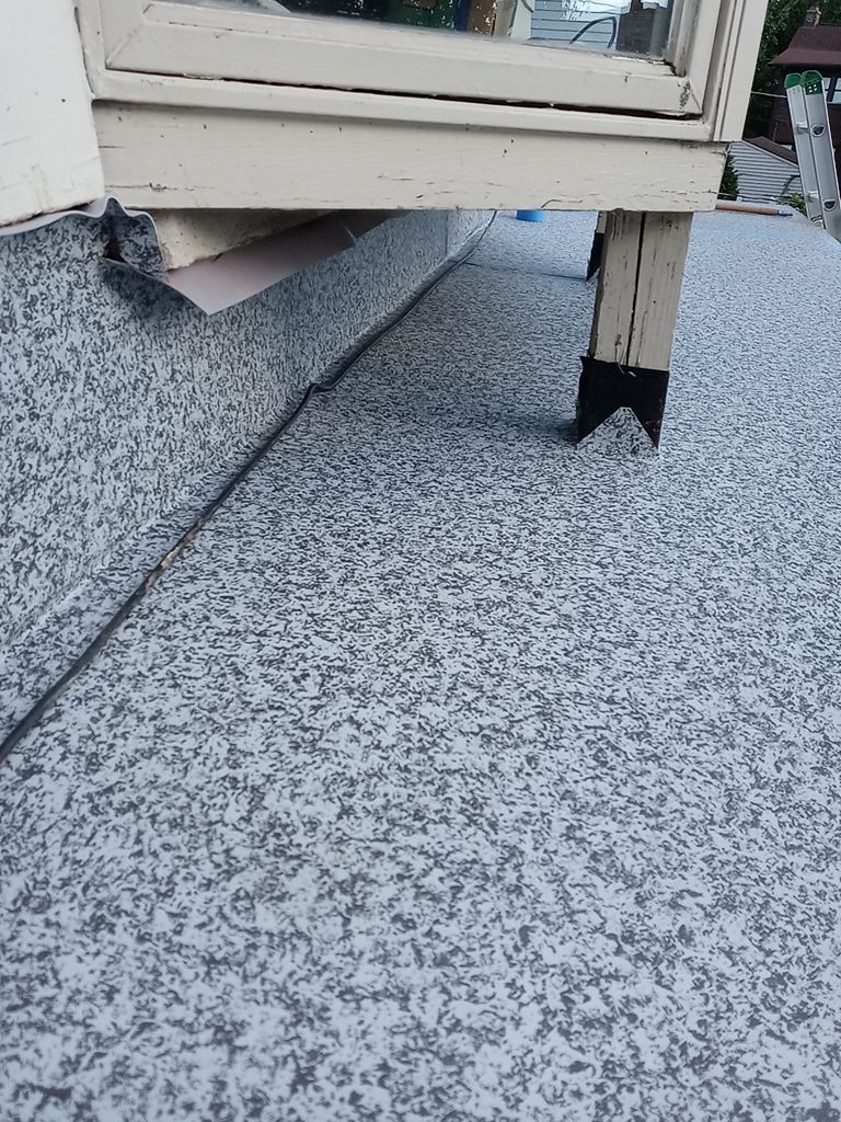Residential Roofing Installation, Dec-tek walk-out porch roof, siding on garage by Absolute Roofing and Construction
