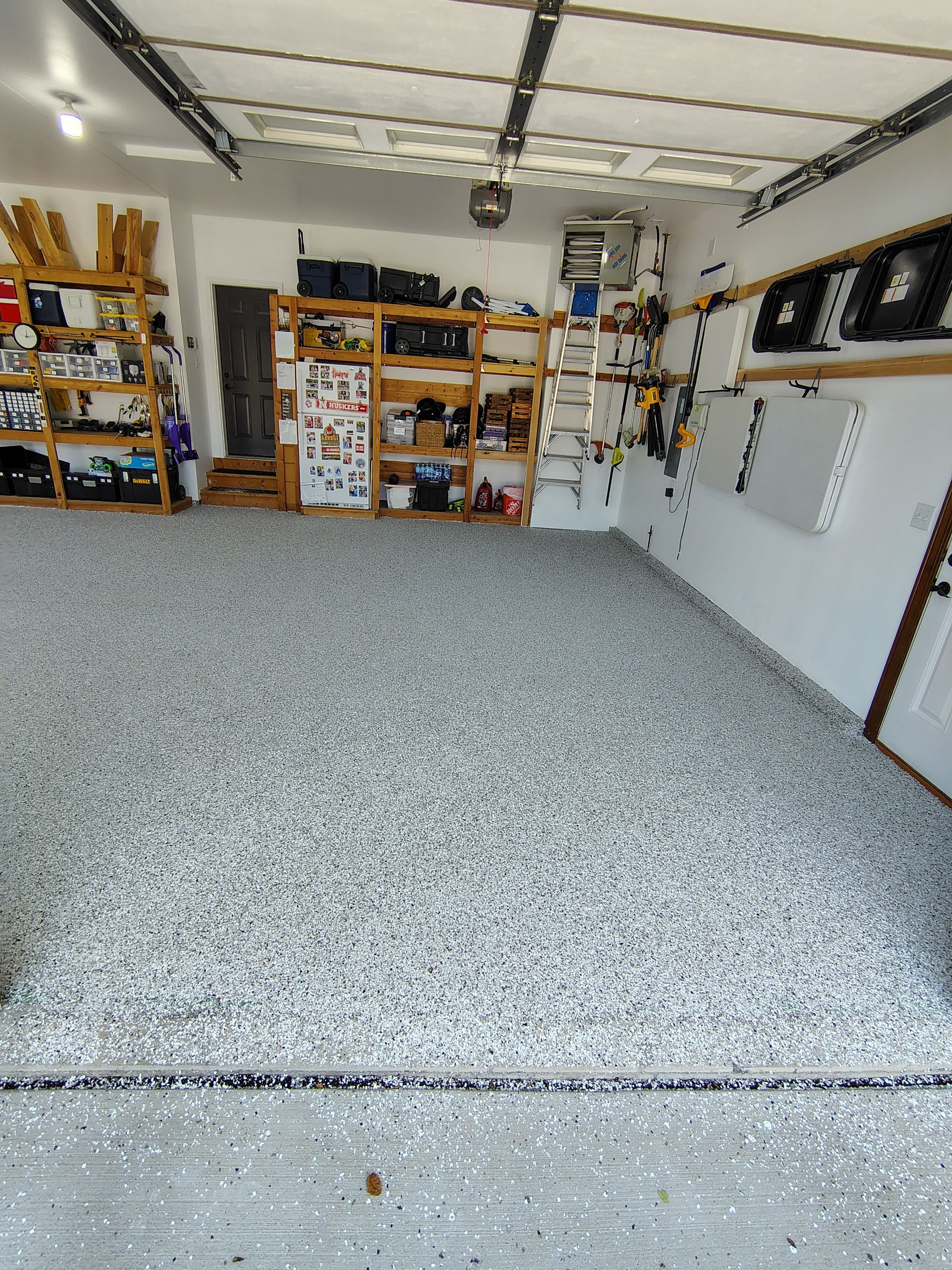 Coyote Garage Floor Coating in Sioux Falls by Select Painting, Coatings & Garage Cabinets