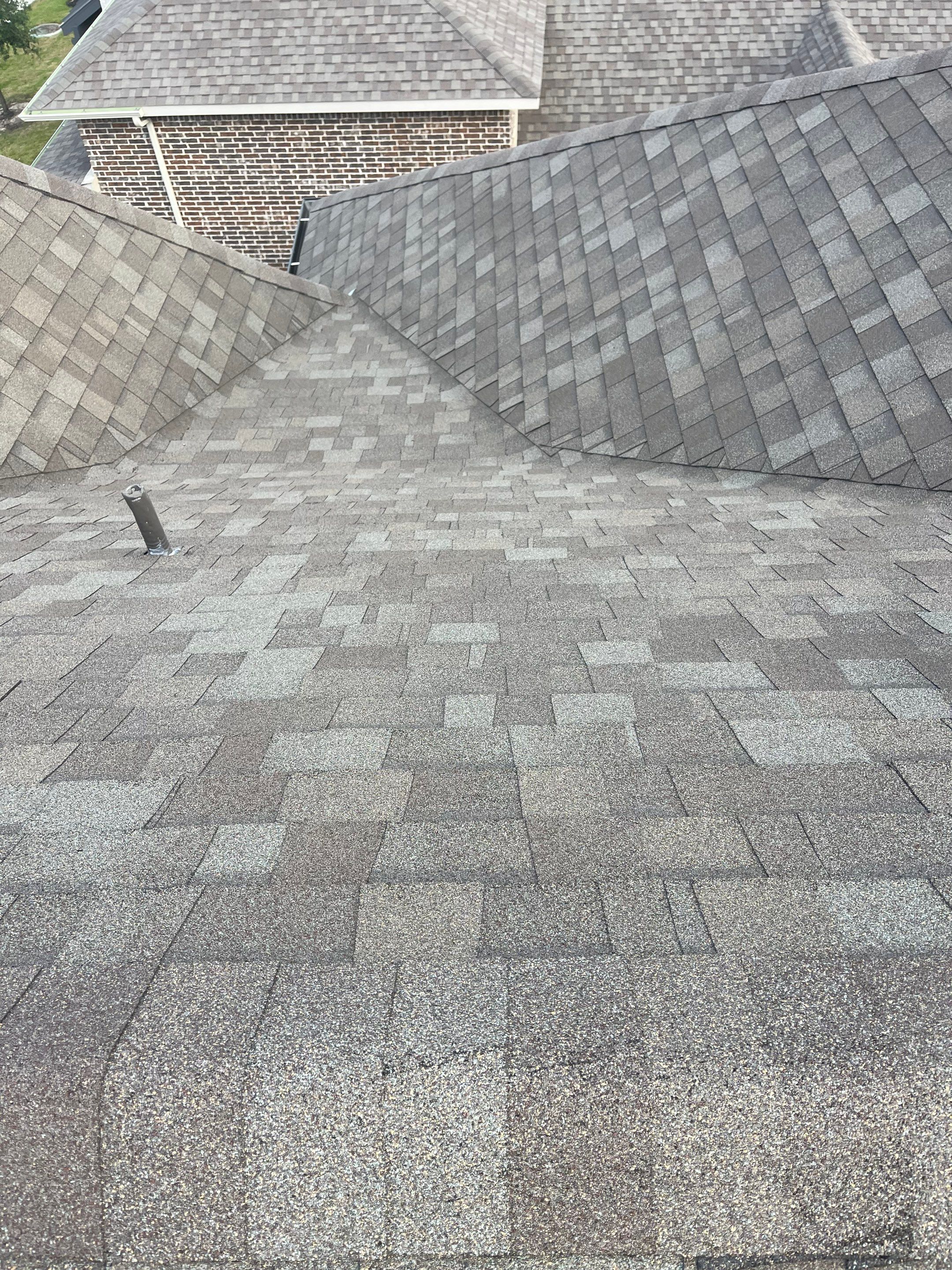 Hail Damage using Owen's Corning Duration (Lifetime) Shingles by Roof Repair Company