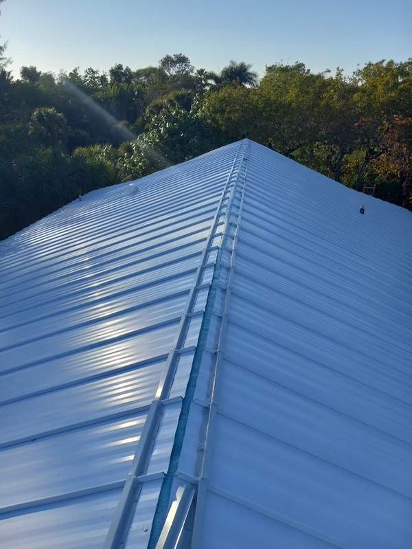 Residential Roofing Installation using Gulf Coast Metals Gulf Seam Panels by Four Peaks Roofing