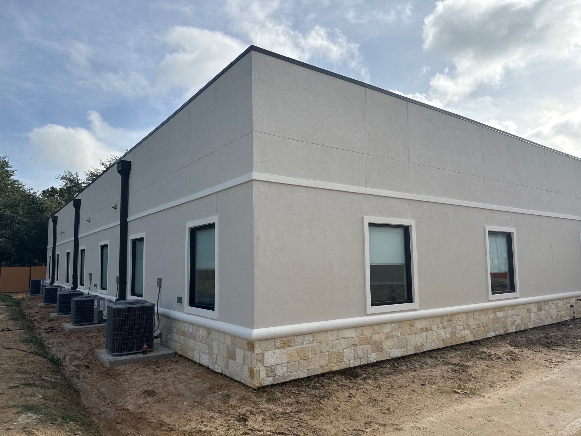 Commercial Façade Excellence with Bullnose Detailing by Apex Conventional Stucco Llc