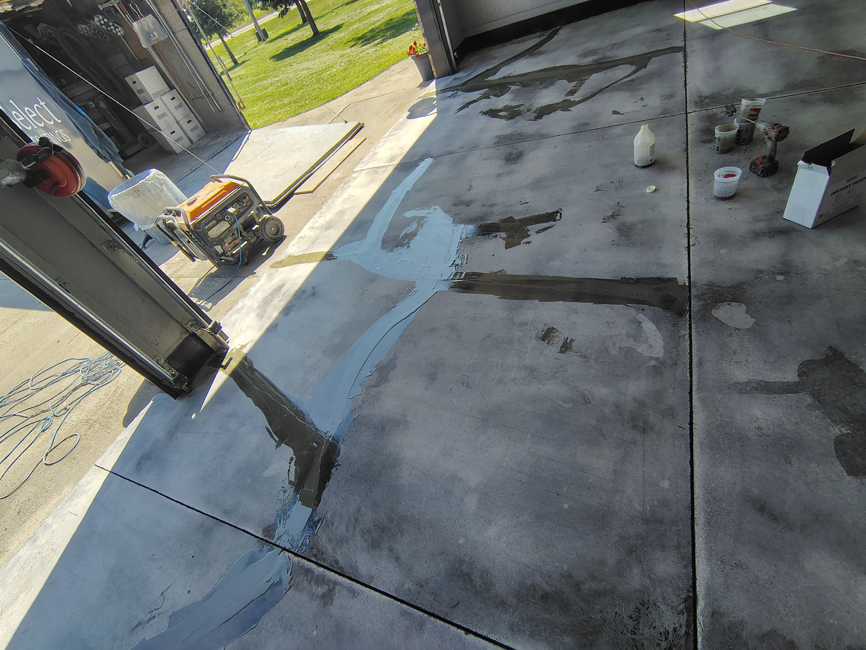 Garage Concrete Floor Coating and Crack Repair in Onawa by Select Painting, Coatings & Garage Cabinets