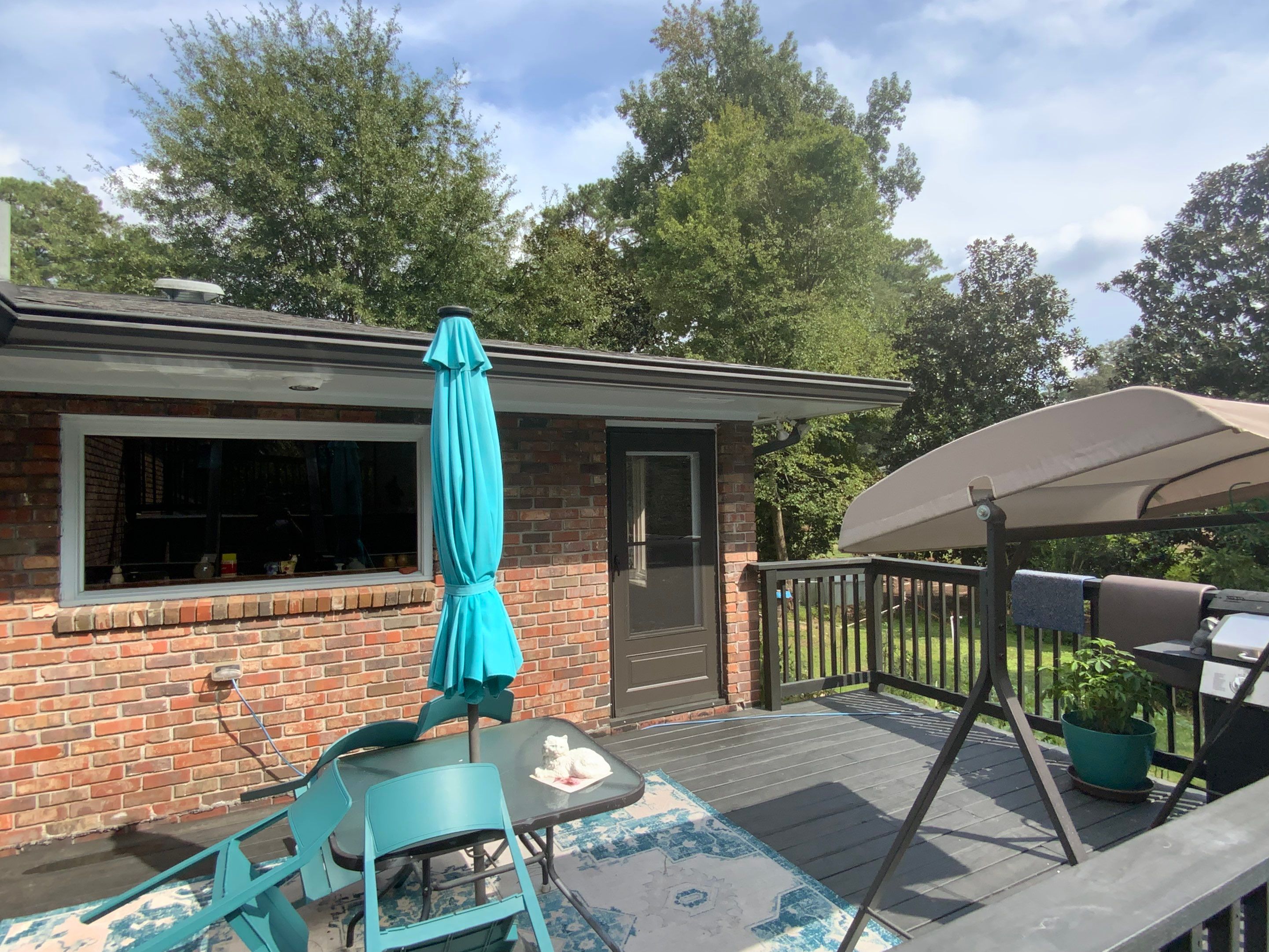 Full Exterior Trim Painting and Multi-Level Deck Staining by Swift Home Renovations