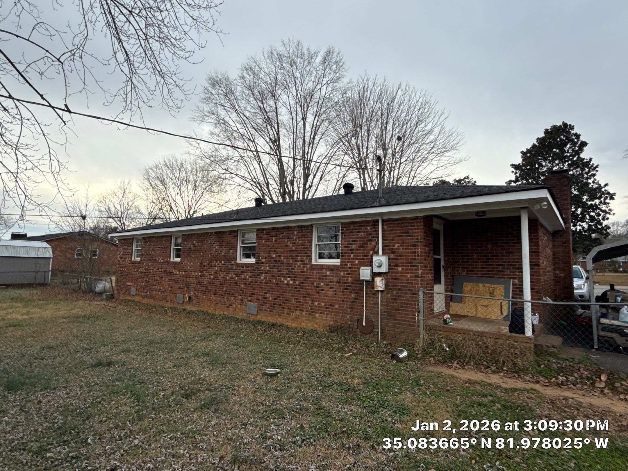 CertainTeed Landmark Moire Black Architectural Shingles on Inman SC Brick Ranch Home by Roofers LLC