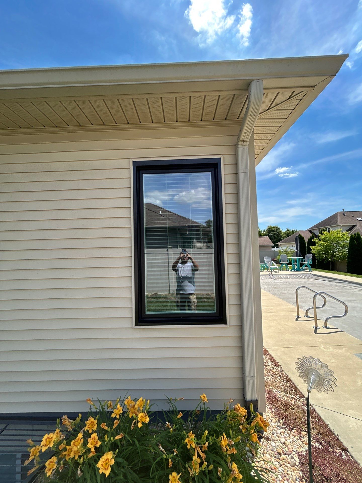 Black Vinyl Window Installation by Merrifield Exteriors, LLC