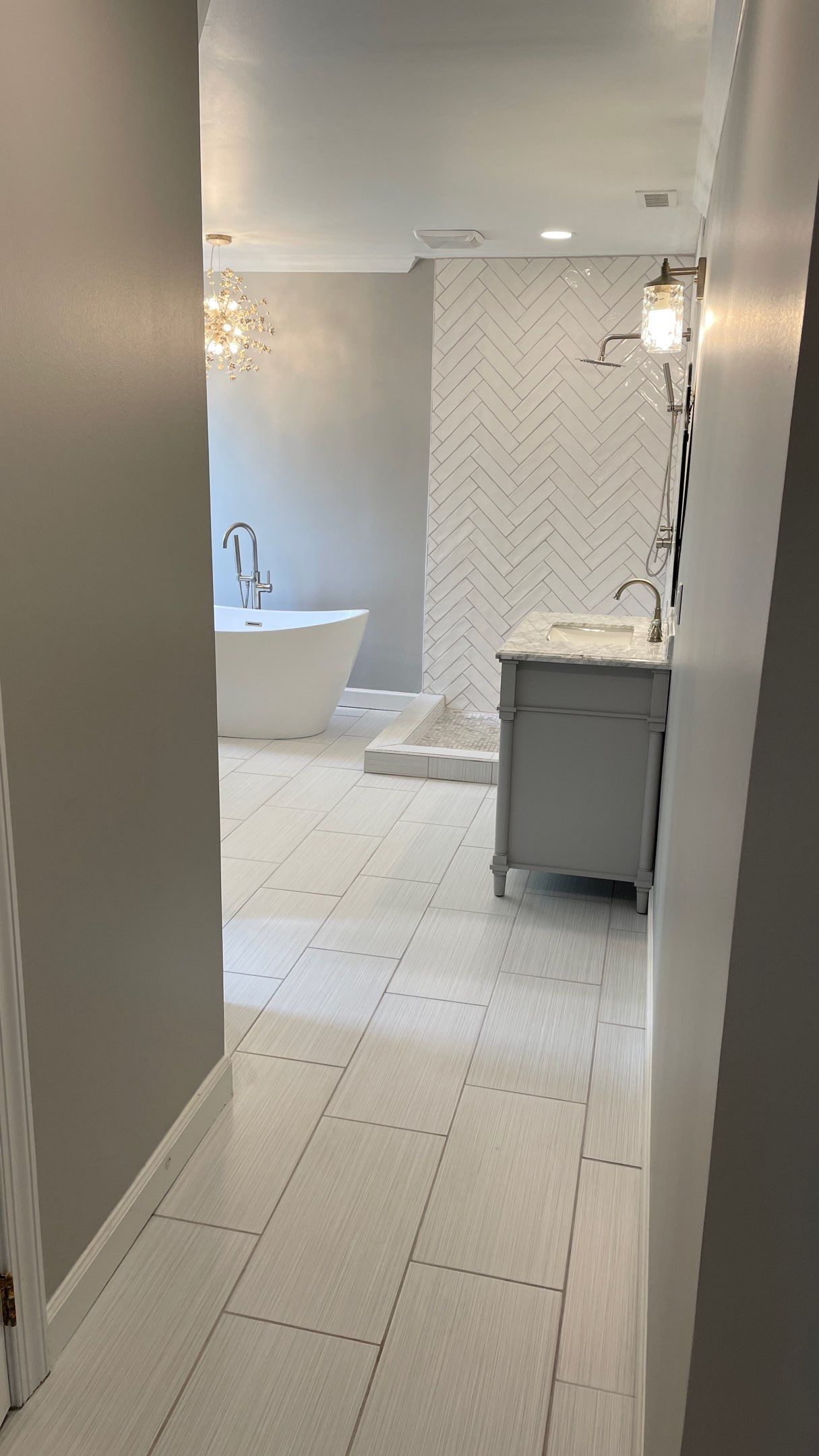 Bathroom Remodel using Schluter by Footprints Floors of Coastal Carolina