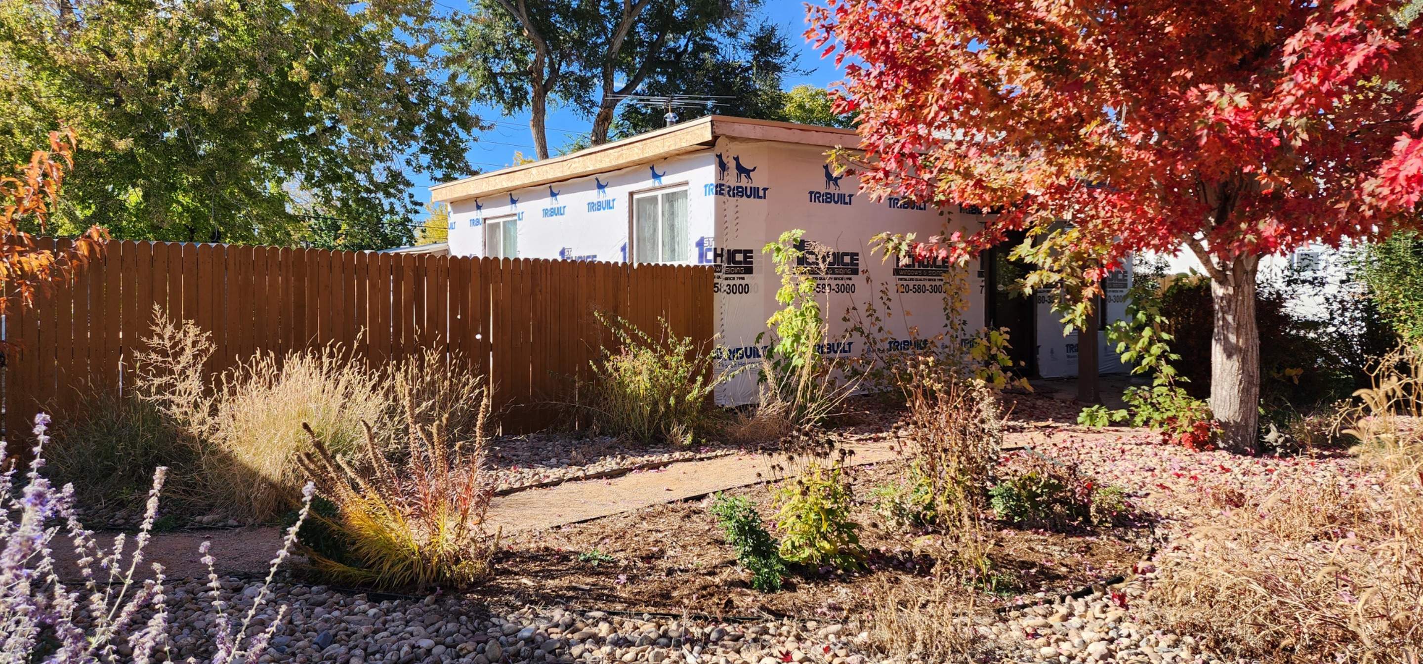 Beautiful little home in Denver receiving Lp Smartside Siding by 1st choice windows and siding