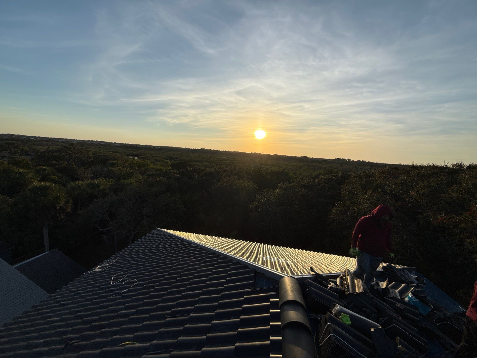 Flagler Beach Residential Tile Roof Replacement with Dark Barrel Tiles by Fortified Roofing Solutions Corp.