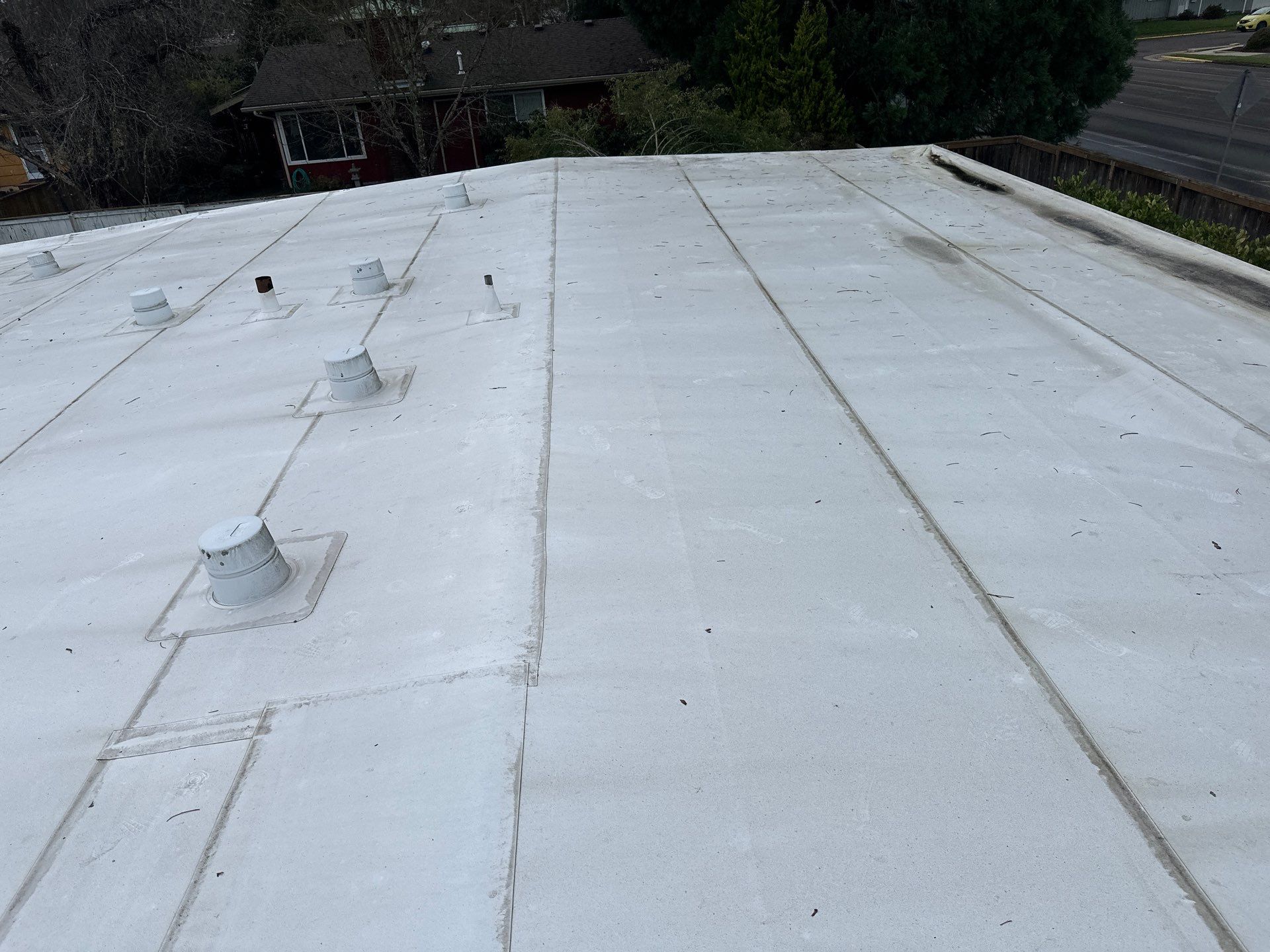 Residential Flat Roof Installation using GAF 60Mil TPO  by Orezona Building & Roofing Company, Inc.