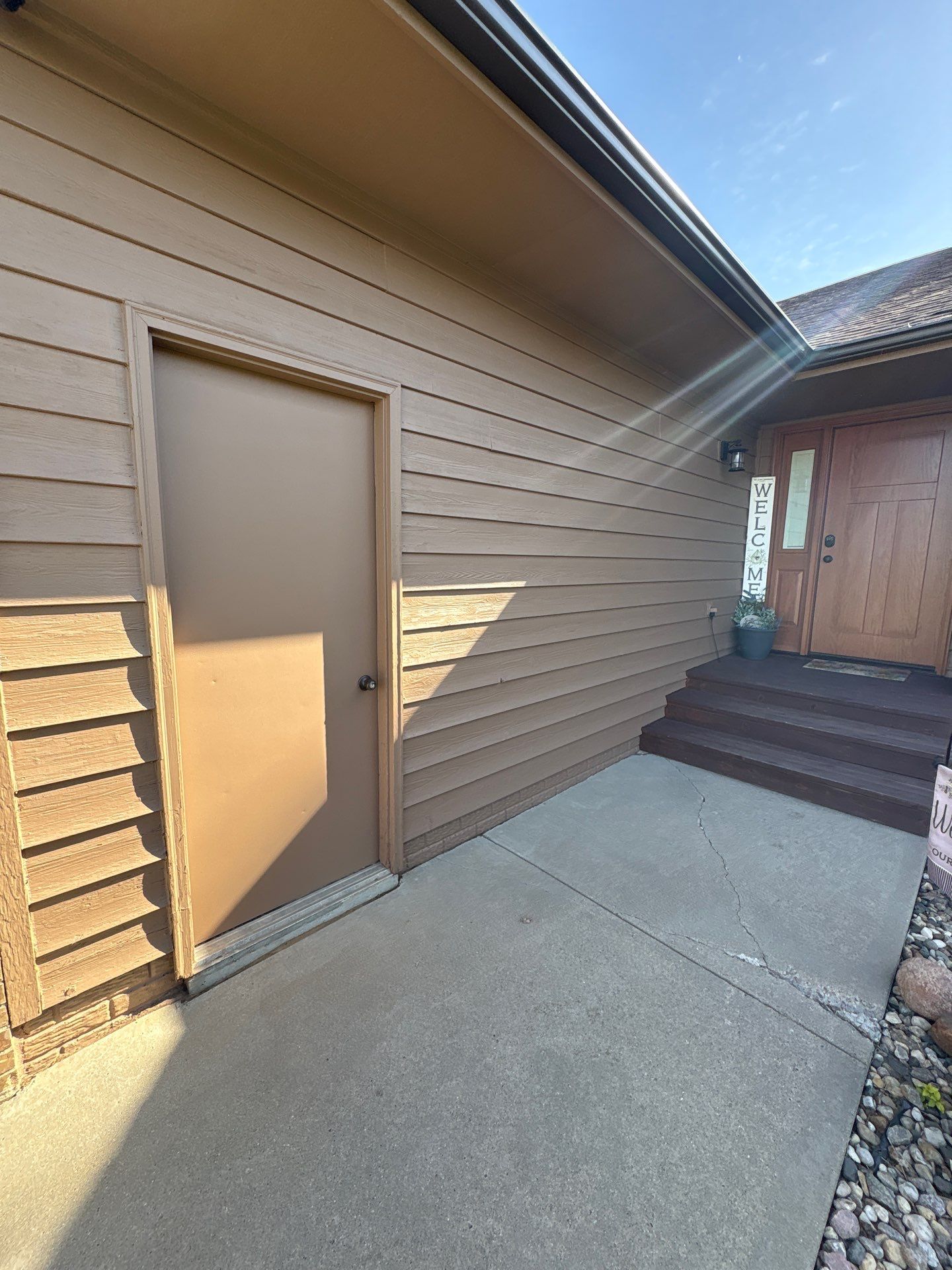 Wood Siding Restoration and Exterior Painting in Sioux Falls by Select Painting, Coatings & Garage Cabinets
