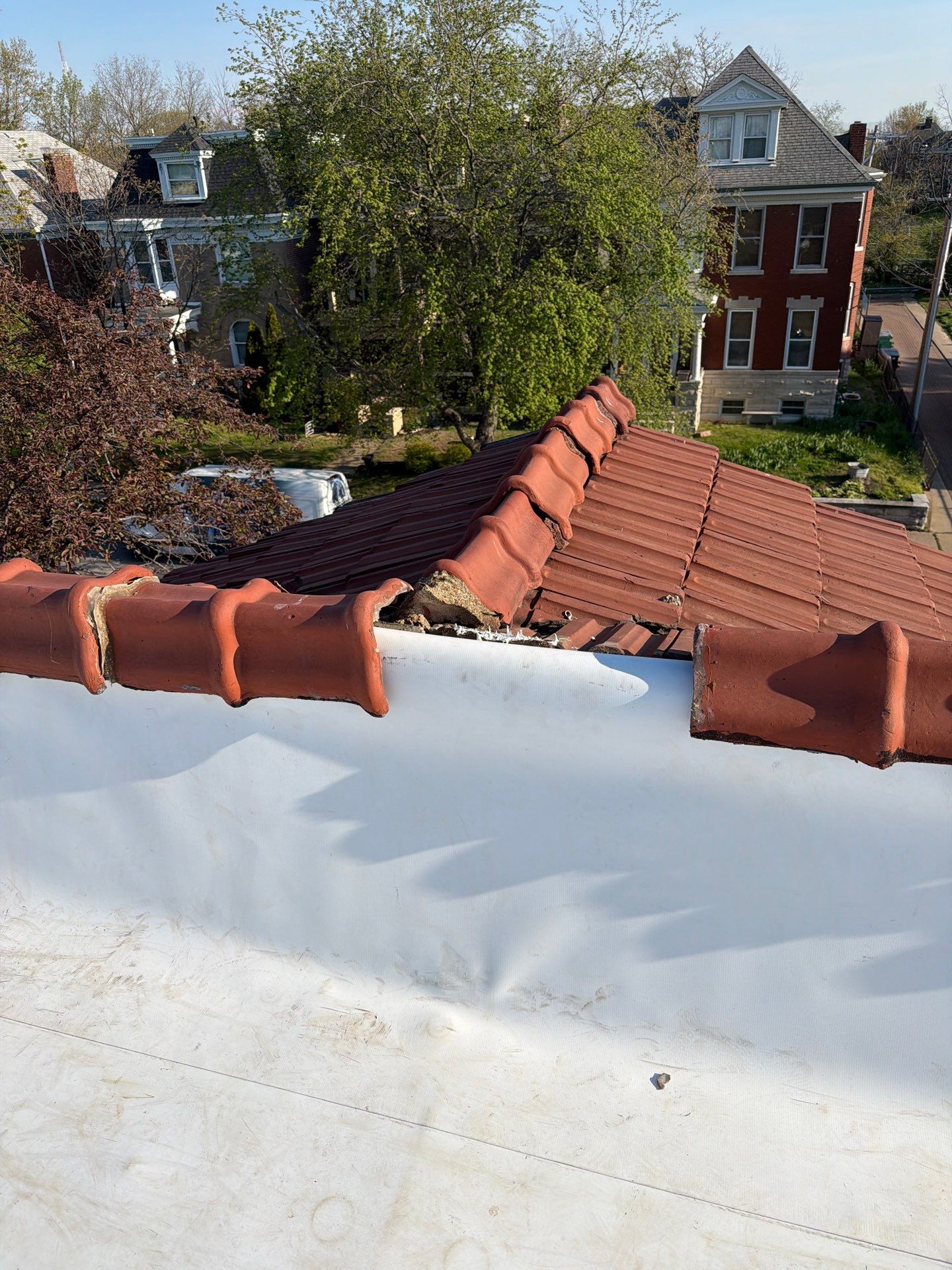 TPO Roof Repair/Replacement with Gutter Install in St. Louis, MO by Acute Roofing And Exteriors 