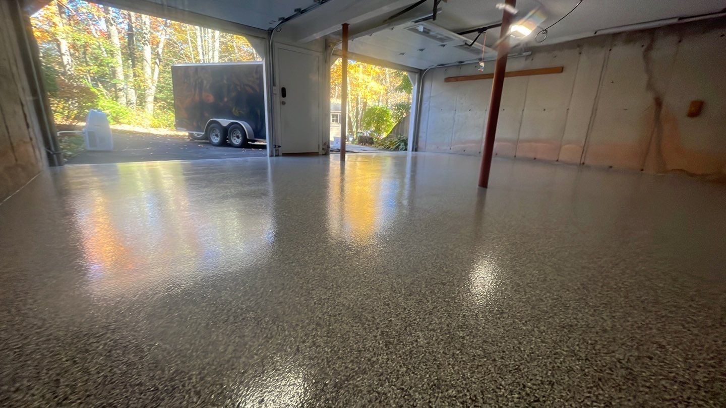 Garage in Londonderry, NH 03053 by Symphony Concrete Coatings