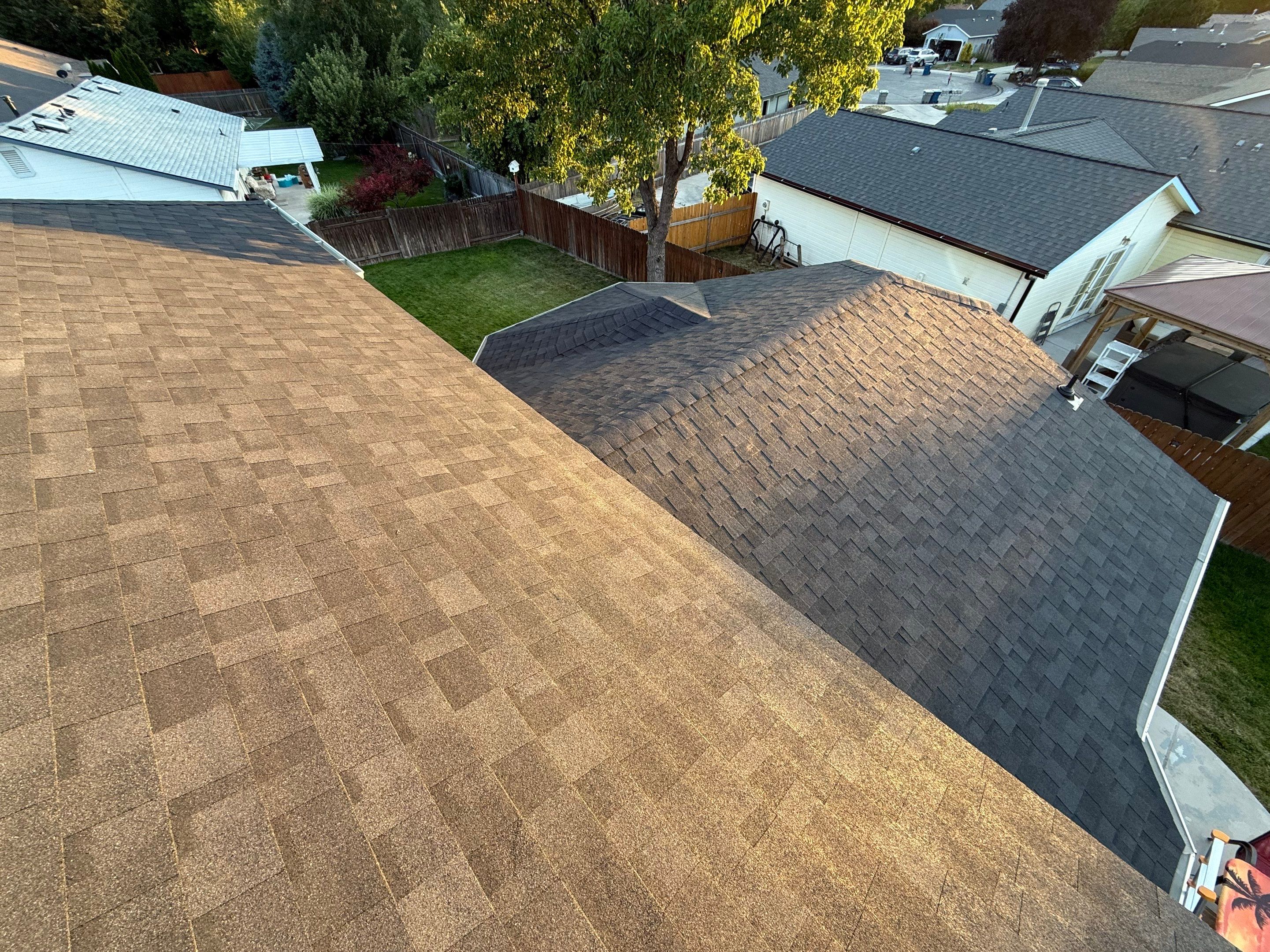 Residential Roof Replacement and Seamless Gutter Installation in Boise by Olive Roofing