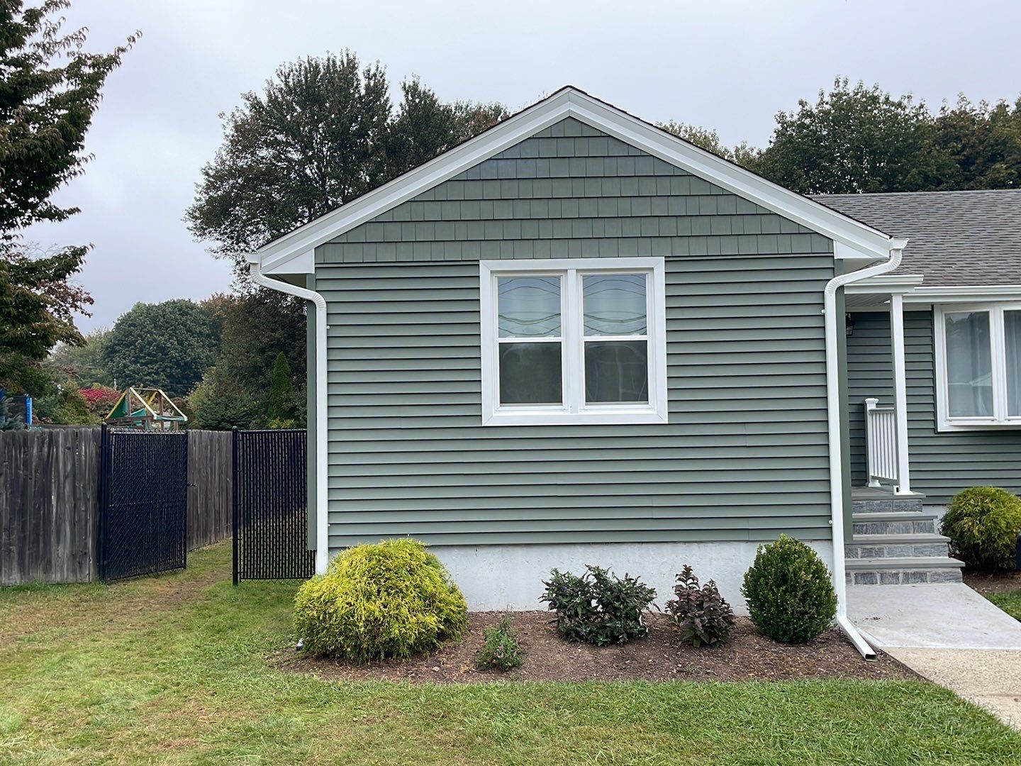 Siding Installation using Certainteed Monogram Forest Green by A Plus Exterior