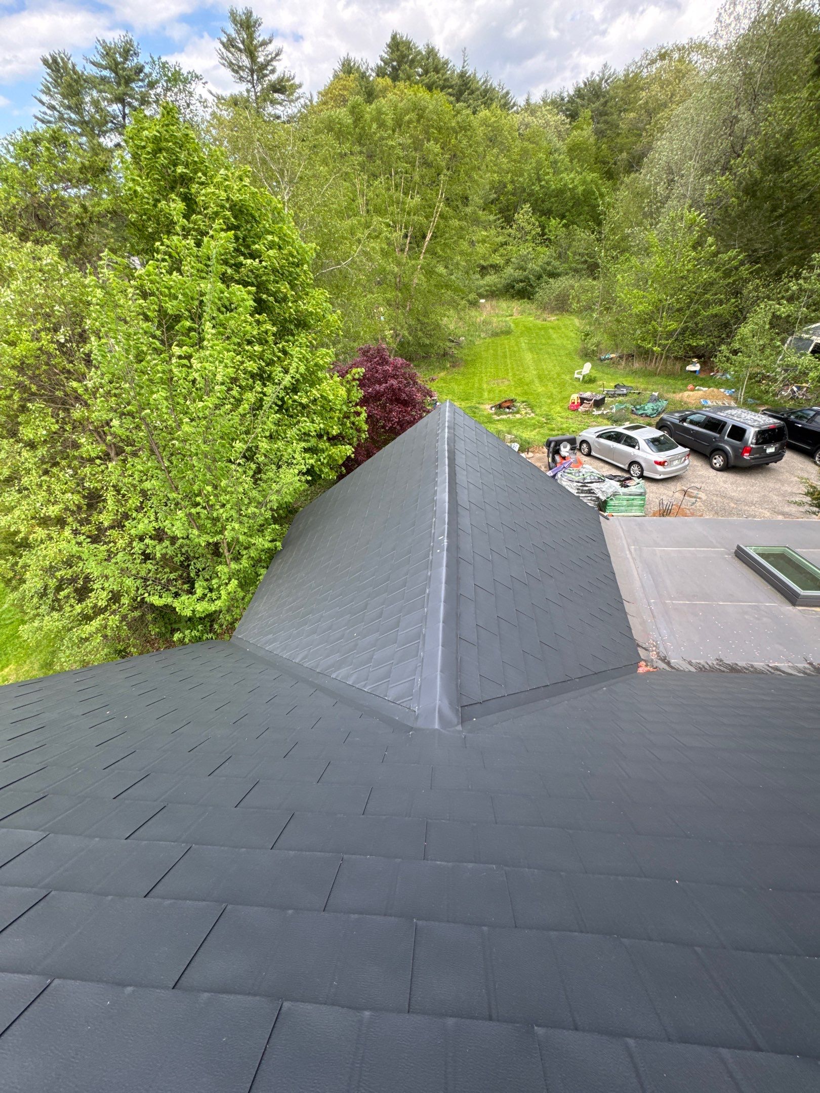 Roof Replacement Near the YMCA in Exeter, NH | Owens Corning Onyx Black by Compass exteriors