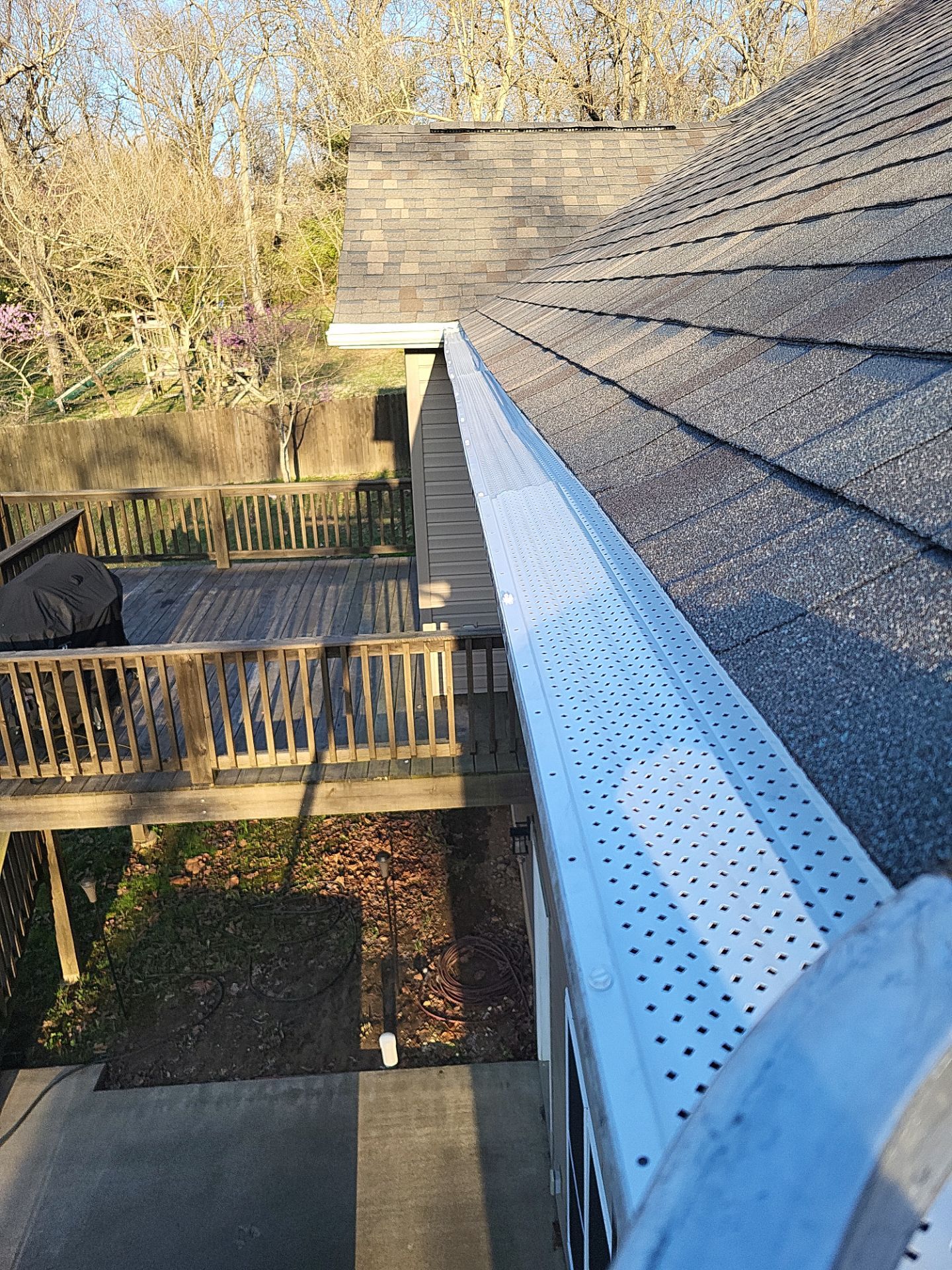 Residential Roofing & Gutter Cover Install  by Titan Commercial & Residential Roofing 