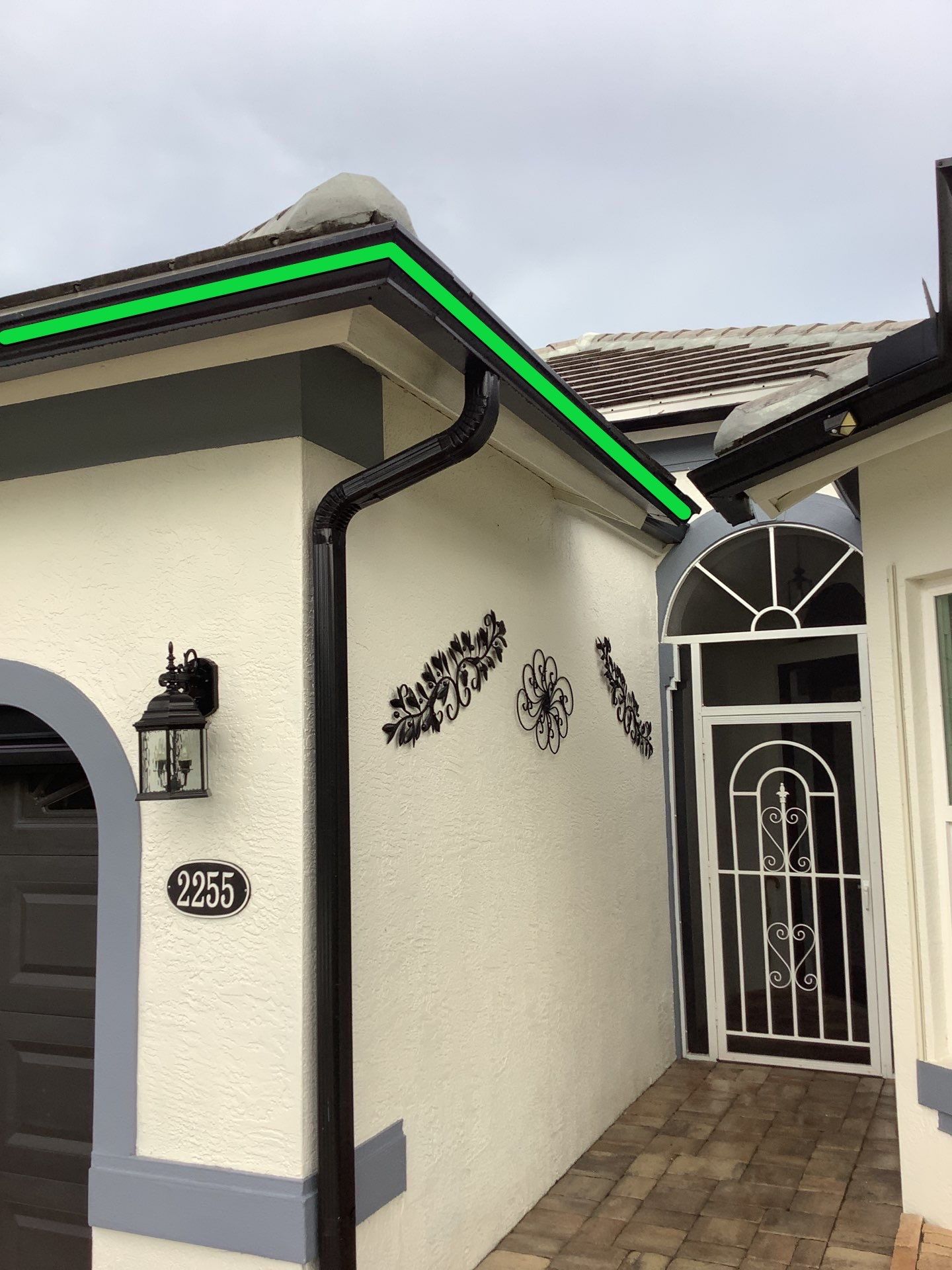 Black Seamless Gutters  by Gutter Professors