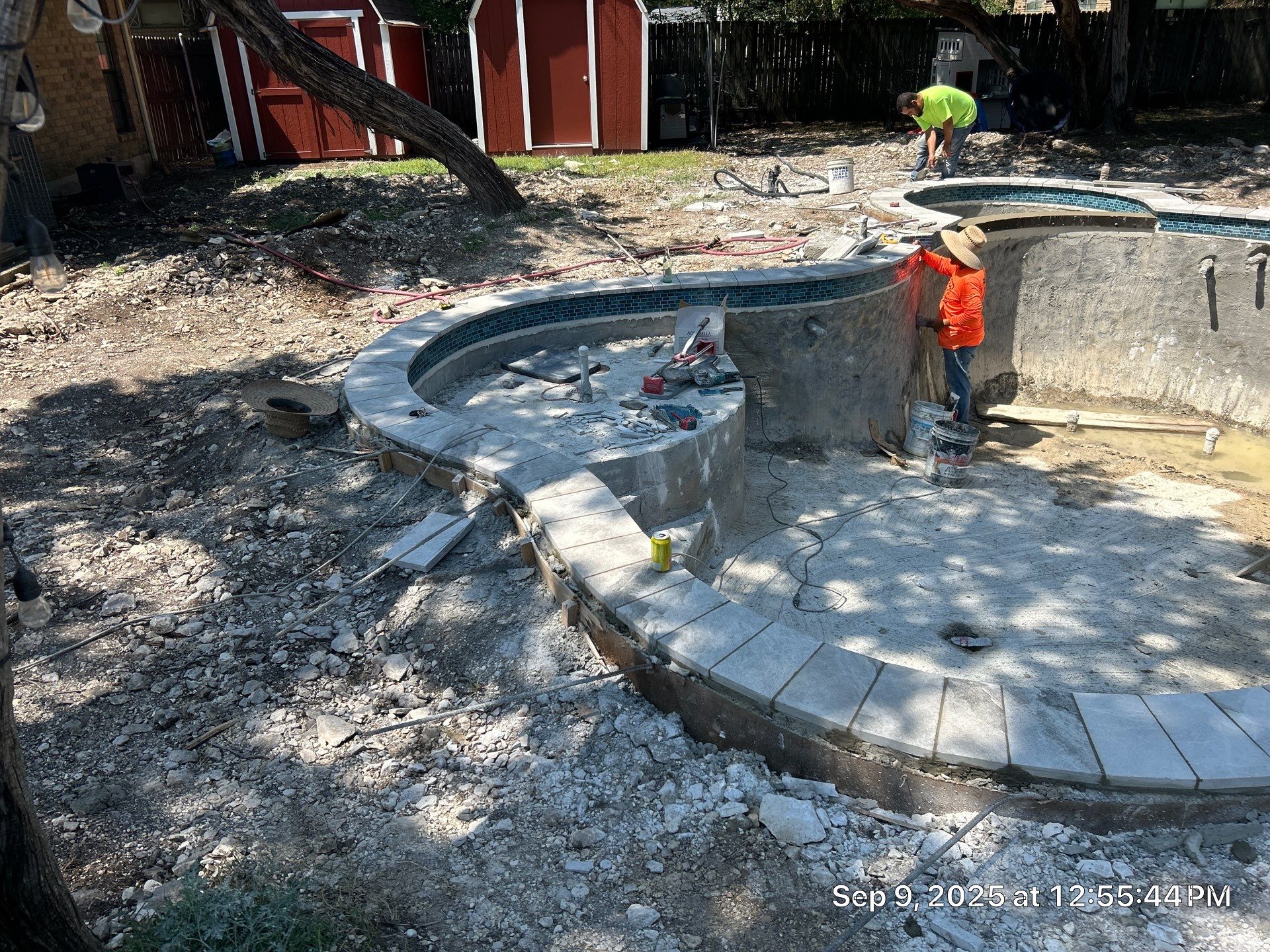 Freeform Pool Remodel with New Decking and Pebble Interior by Pinnacle Pools and Spas - DFW