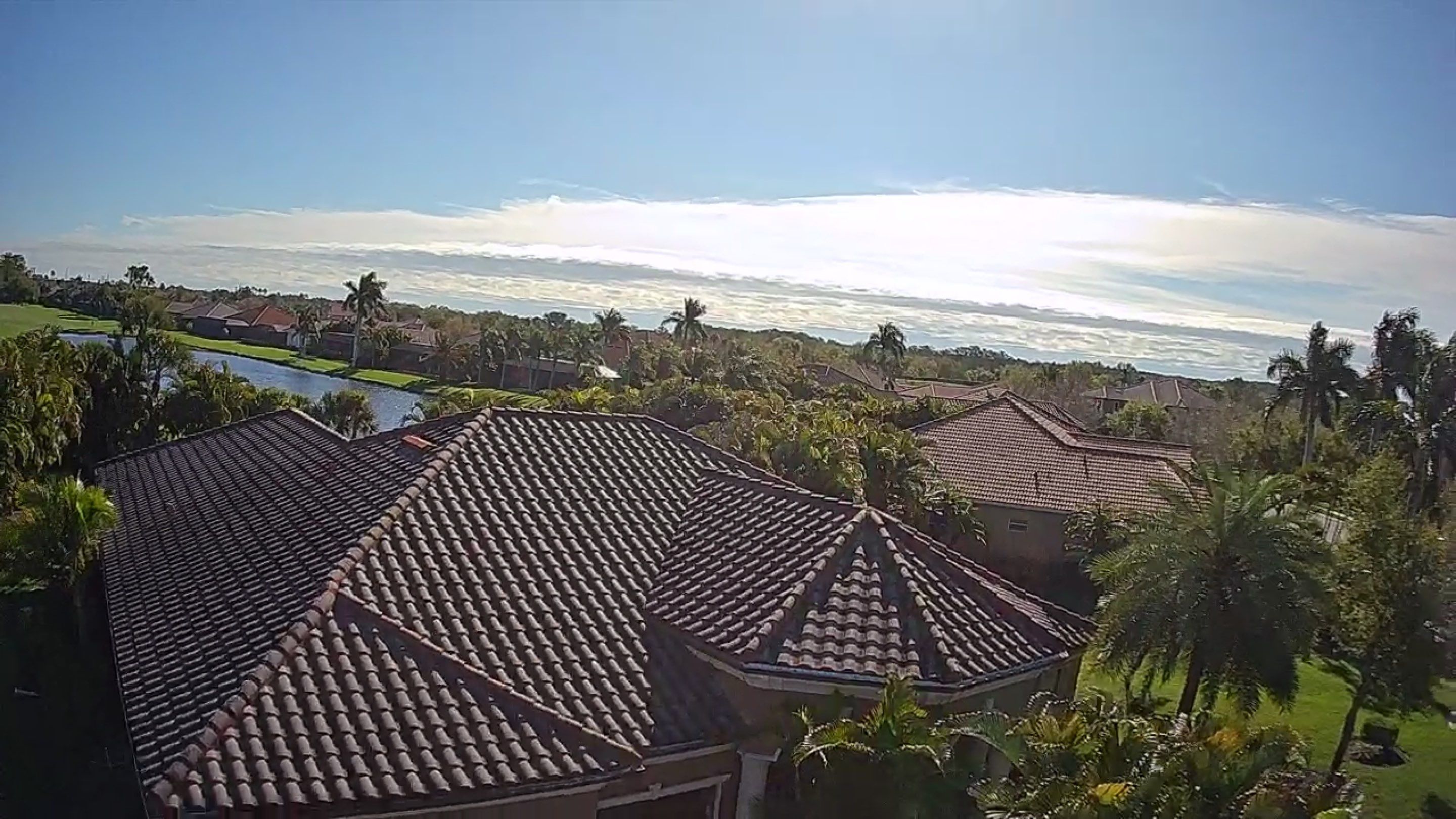 This project focused on a full gutter clean-out to restore proper water flow and prevent overflow issues.  Our scope of work included: 	•	Removing heavy leaf and pollen buildup from the gutter system 	•	Clearing out clogged sections along the rear gutters near the pool cage, where debris tends to accumulate more heavily 	•	Inspecting and cleaning the front gutter guards, which had several blocked areas restricting water flow 	•	Ensuring all downspouts and channels were flowing properly after service  Even with gutter guards installed, debris like pollen, shingle grit, and fine organic matter can still build up over time—especially in Florida’s environment. Regular maintenance helps prevent water damage, overflow, and staining on exterior surfaces.  Another thorough job completed by Sunshine AquaWash® – keeping homes protected from top to bottom. by Sunshine AquaWash