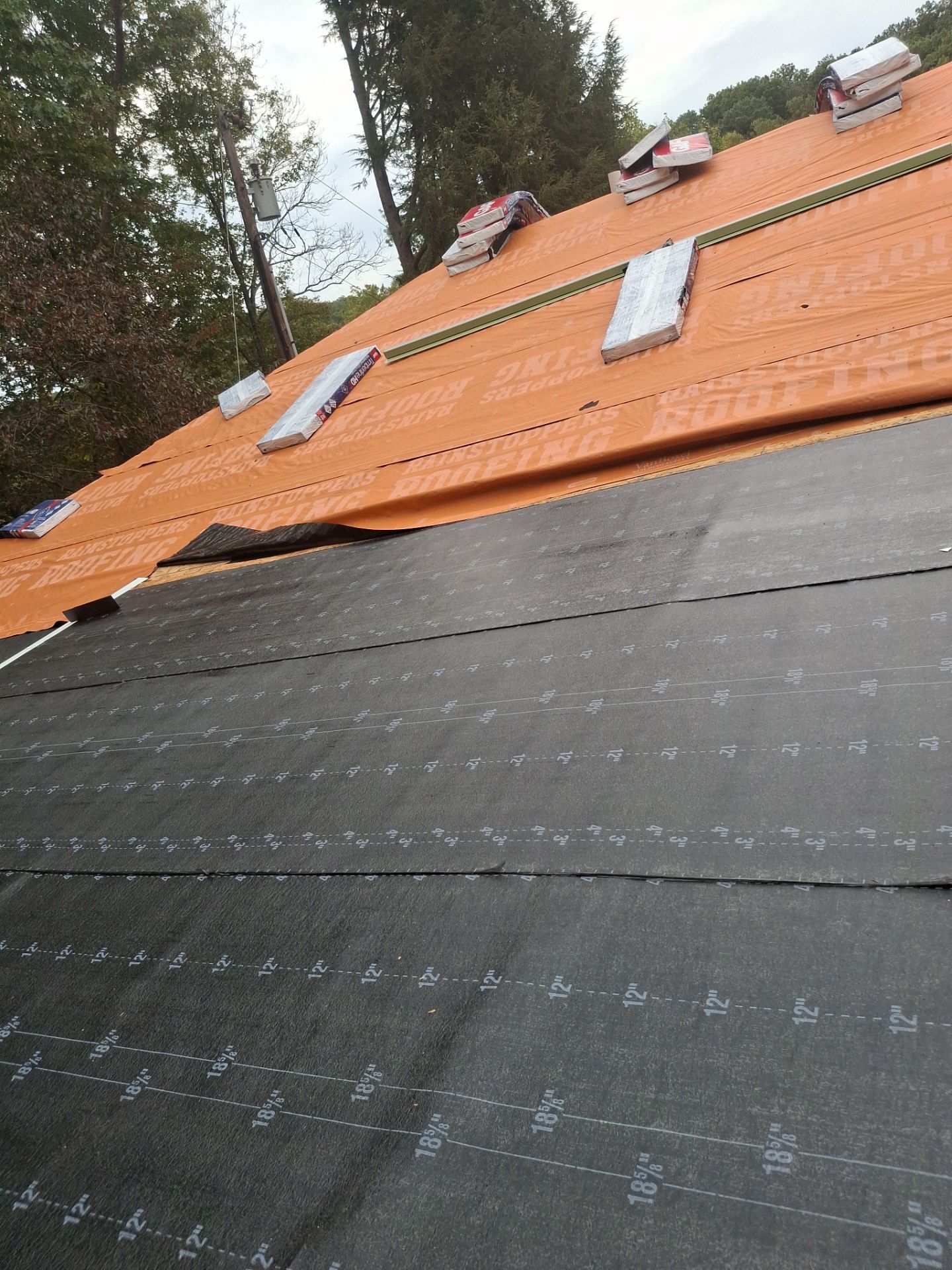 Residential Roofing Installation using GAF Timberline HDZ Charcoal by Rainstoppers Roofing