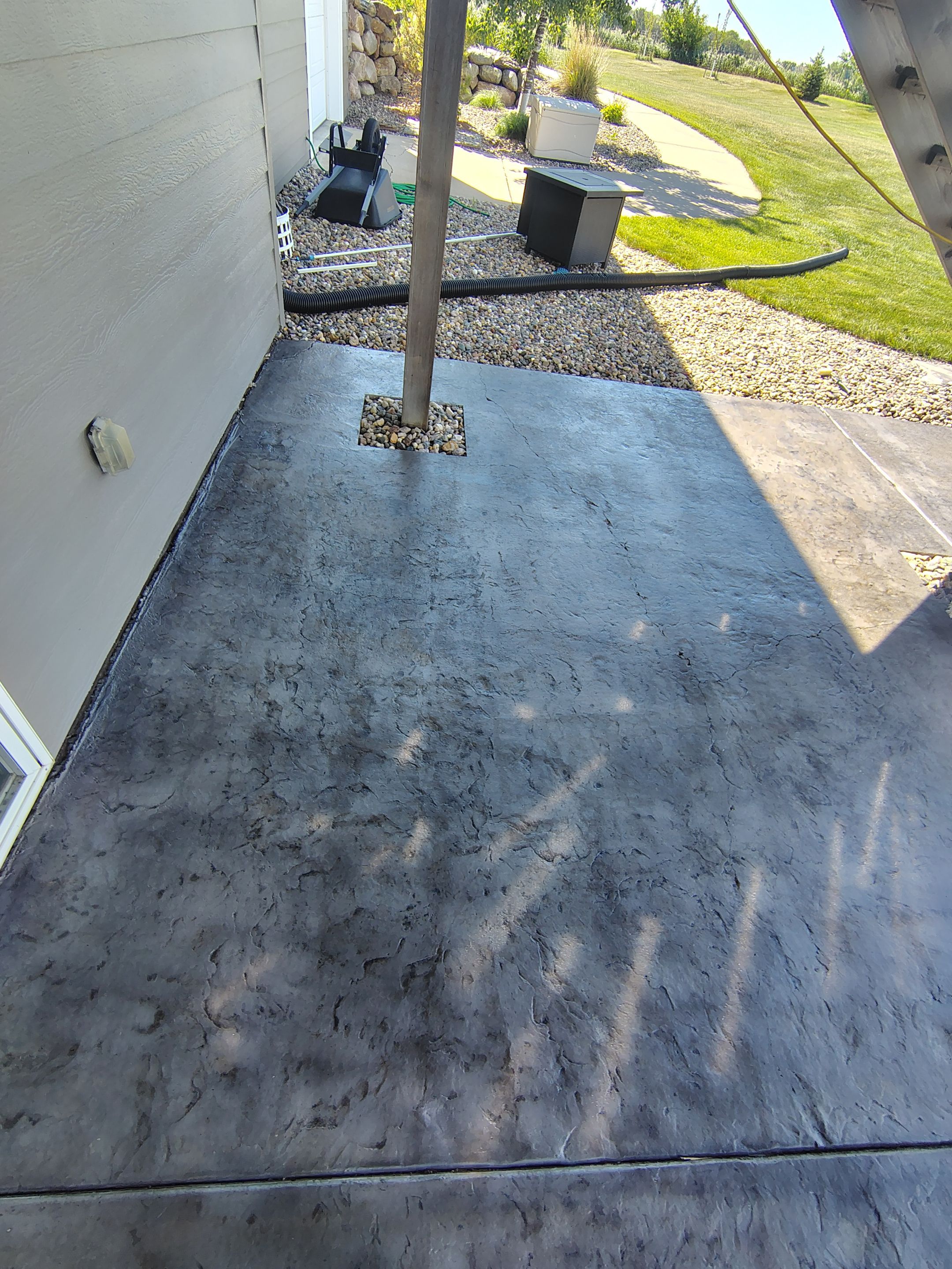 Concrete Patio Restoration and Installation in Sioux Falls by Select Painting, Coatings & Garage Cabinets