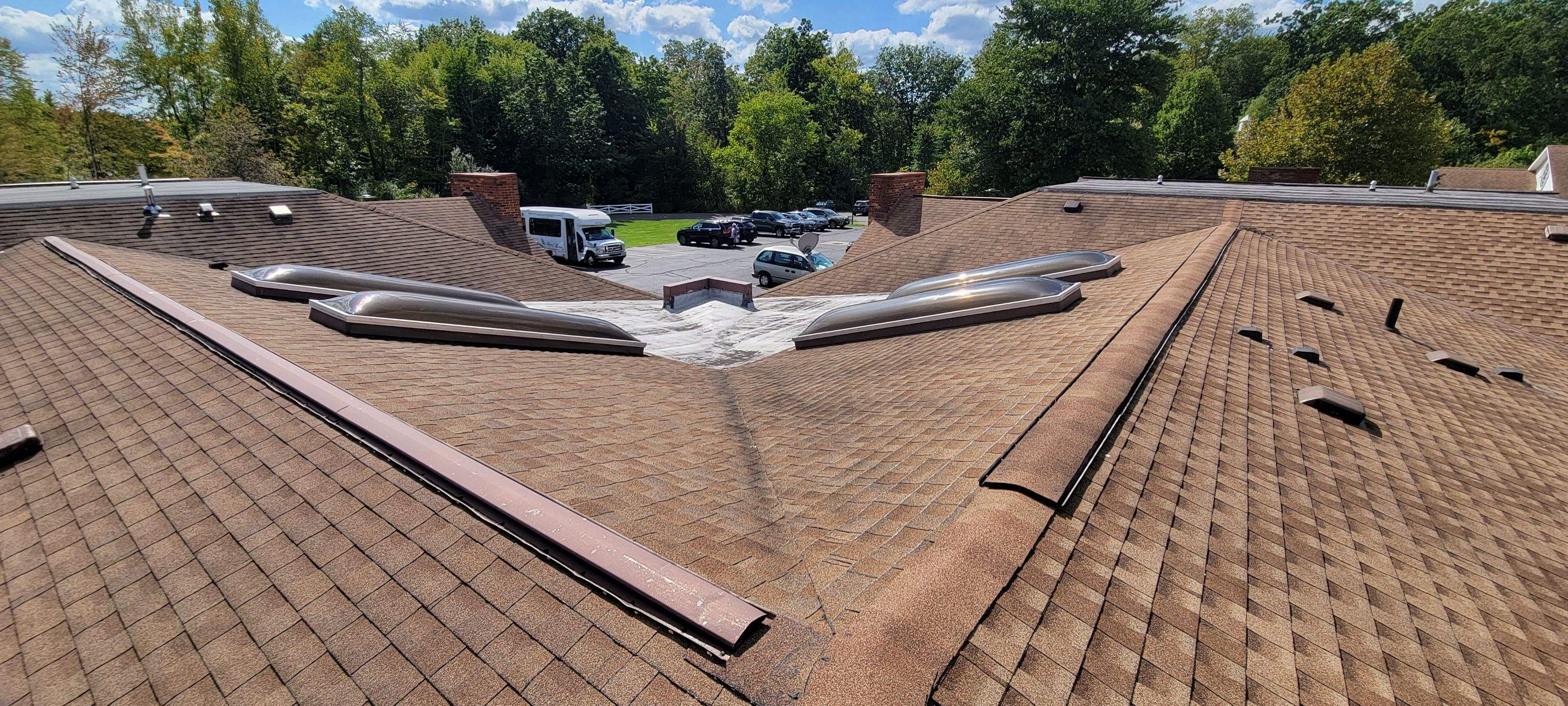 Skylight removal and install  by Absolute Roofing and Construction