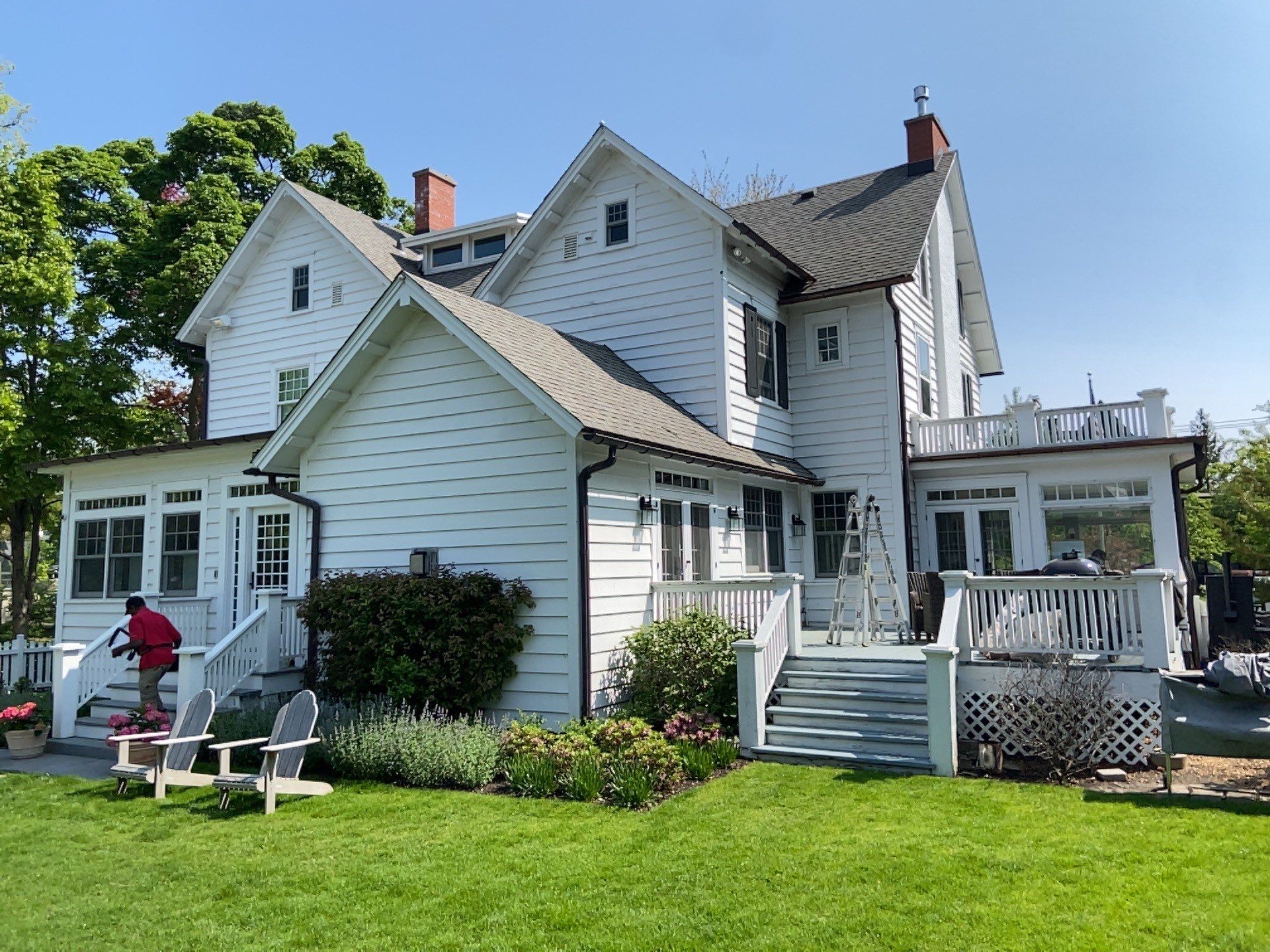 Asphalt Roof Replacement with Half Round Copper Gutter Installment by Custom Installations