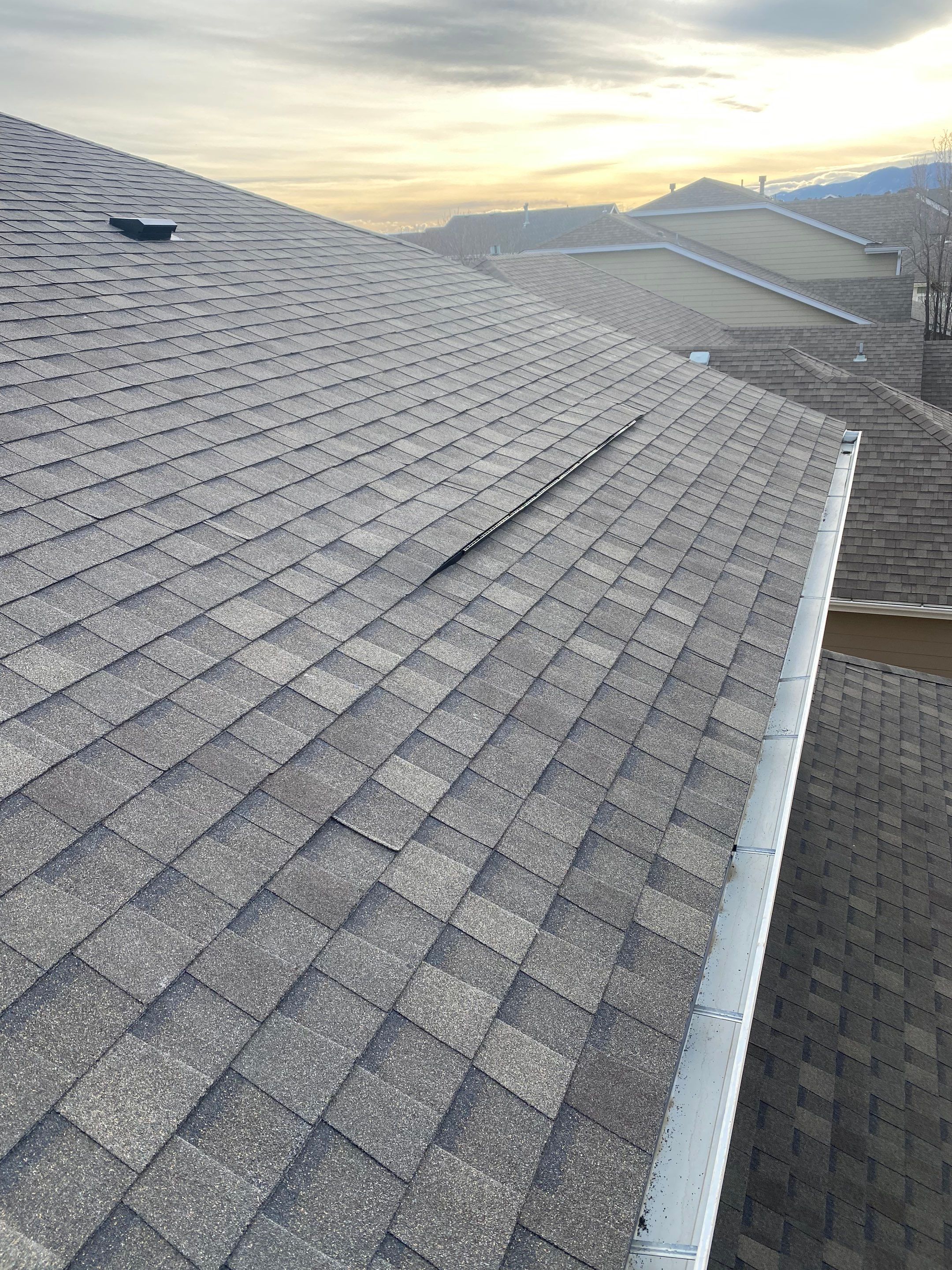 Resdiental Hail Damage Roof Replacement using Atlas Pinnacle Class 4 Impact Resistant "Weathered Wood" color by Black Belt Roofing