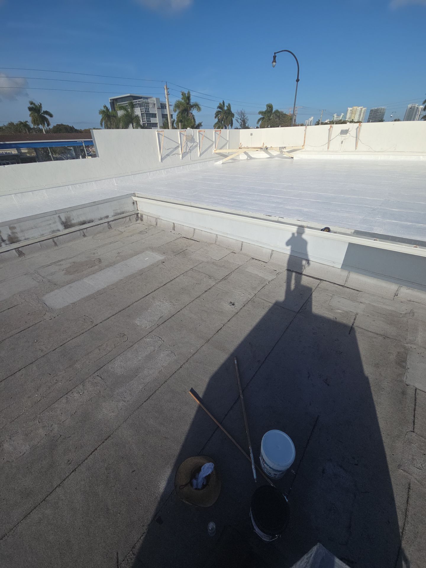 Commercial Flat Roof Restoration Using Silicone Coating in Hallandale Beach by Aastro Roofing