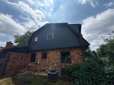 Siding Replacement using Alside Charter Oak D4.5"