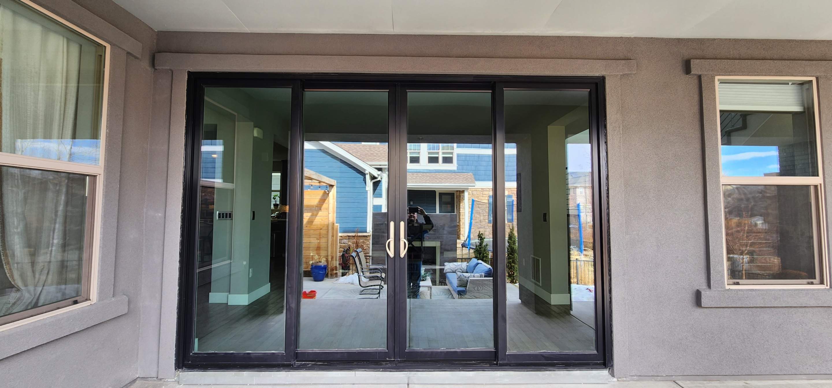 Open your space up to the outside! 4 Panel Patio door replacing 2 windows by 1st choice windows and siding