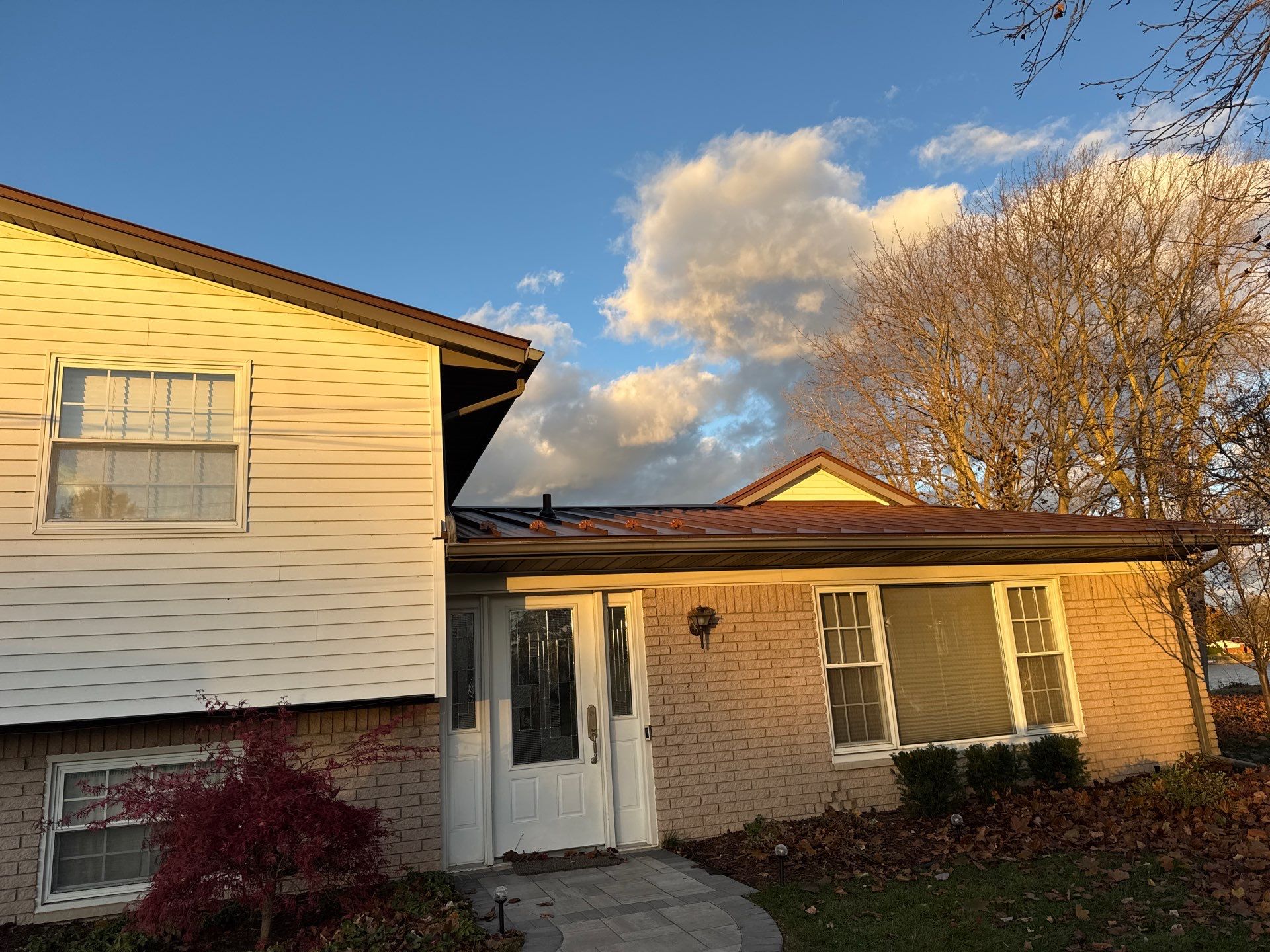 Roof Replacement using MS Standing Seam Roof Western Rust by 180 Contractors