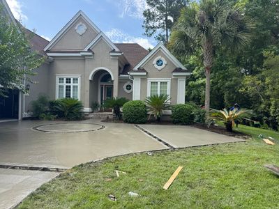 Custom Concrete Driveway and Decorative Paver Installation in Bluffton