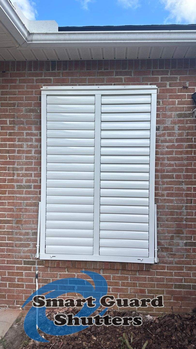 Impact Bahama Shutters in Signal White by Smart Guard Shutters