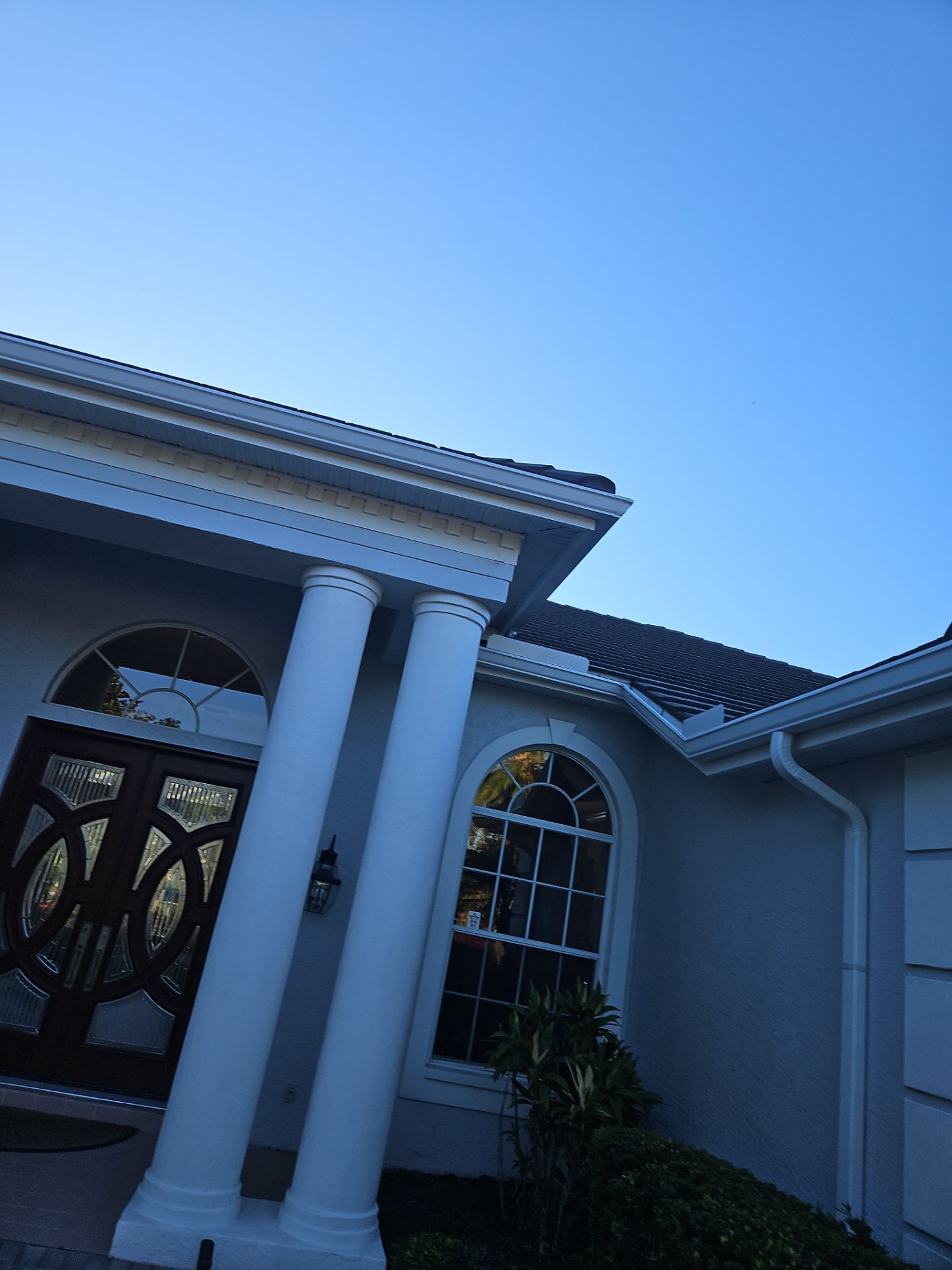 White Down Spouts using downspouts and White Seamless Gutters in Sarasota FL by Gutter Professors