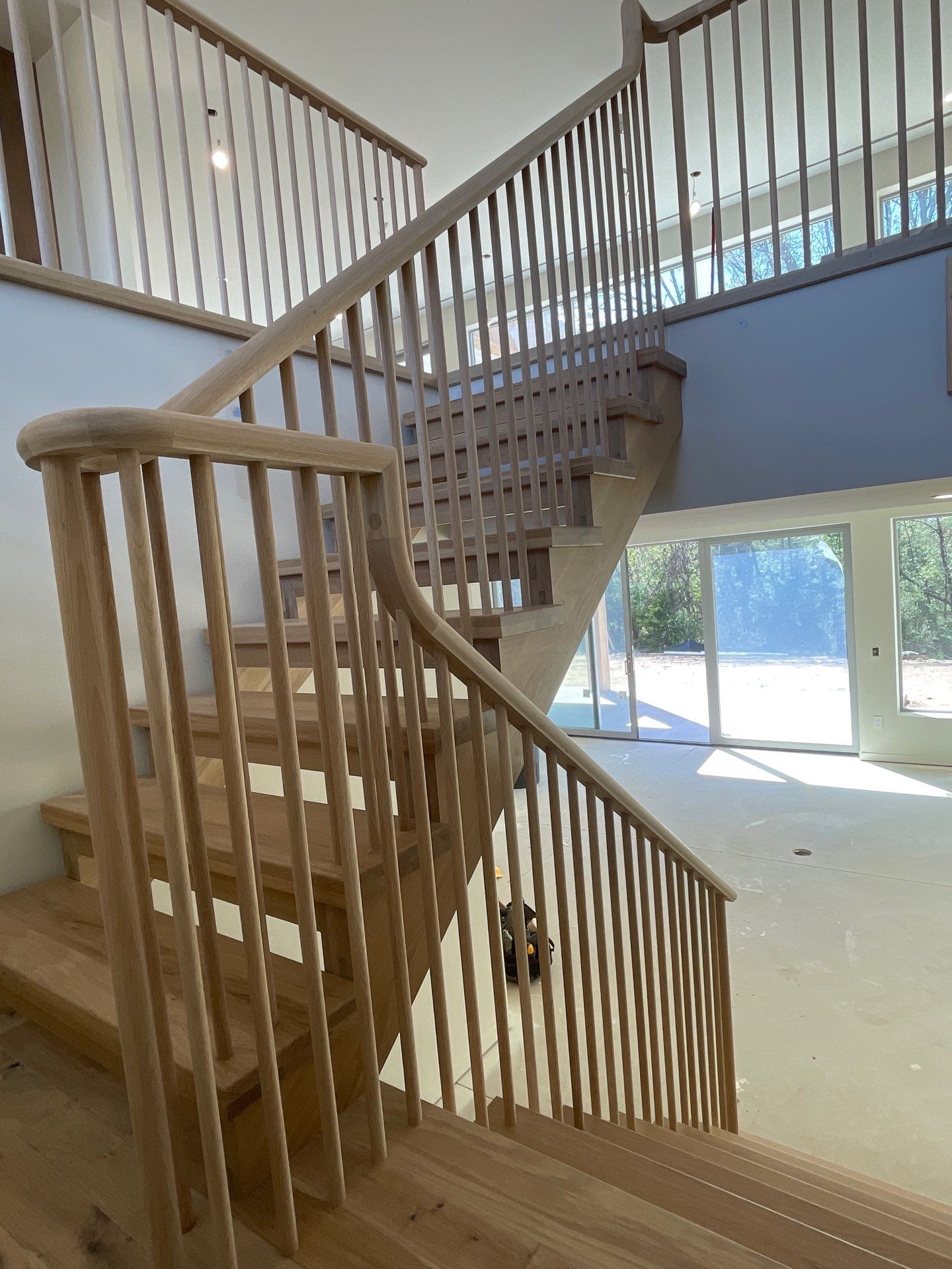 Hand Carved Staircase steals the show by RTBaldwin Hardwood Floors