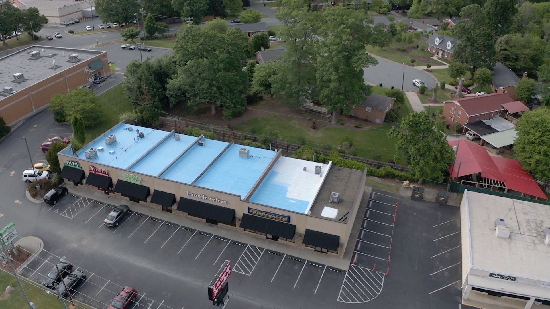 Commercial Roof Coating using Fiberseal basecoat and Silicon Topcoat by Just In Time Roofing and Restoration