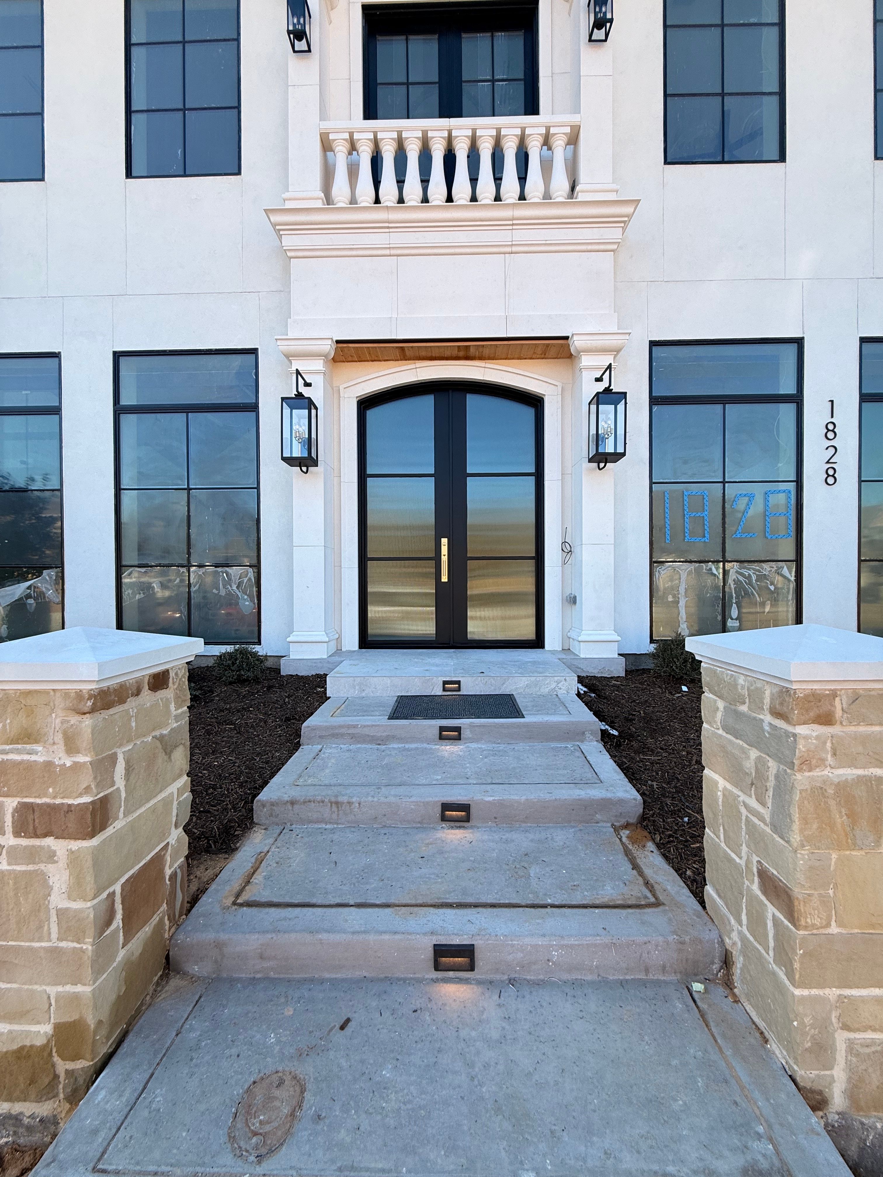 Custom Arched Entry Door Installation and Finishing in Southlake by Solara Custom Living