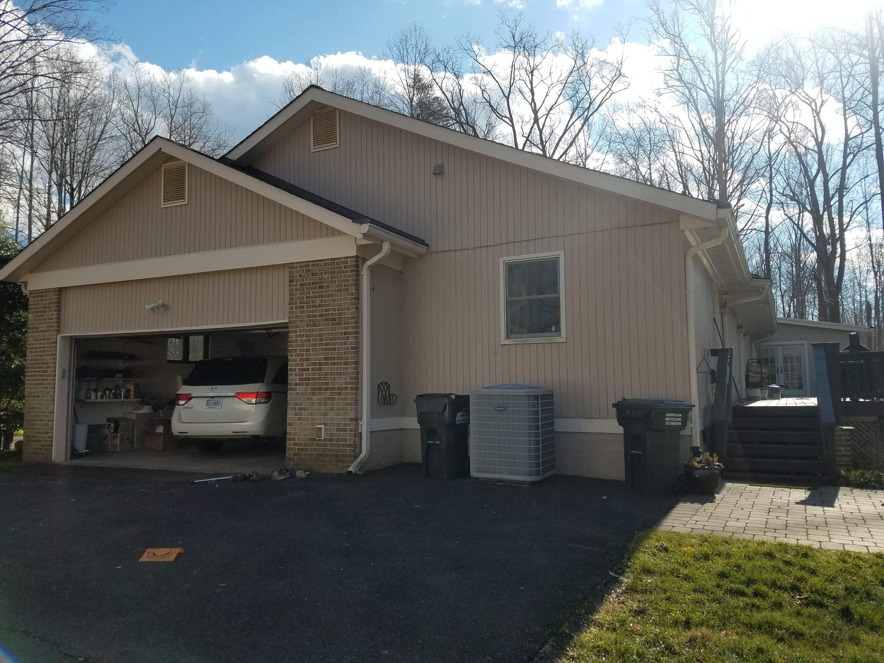 Roof, Siding, Door, and gutter replacement by American Home Contractors