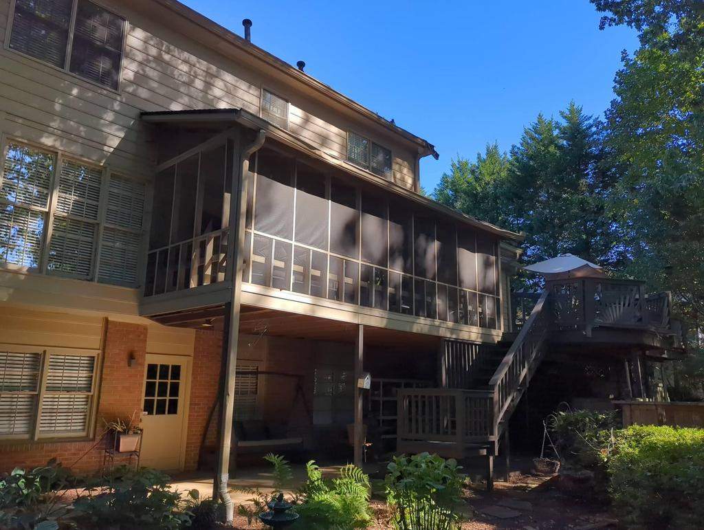 Deckorators Voyage Deck and Shed Style Covered Porch Build with Drink Rail by Nelson Exteriors 