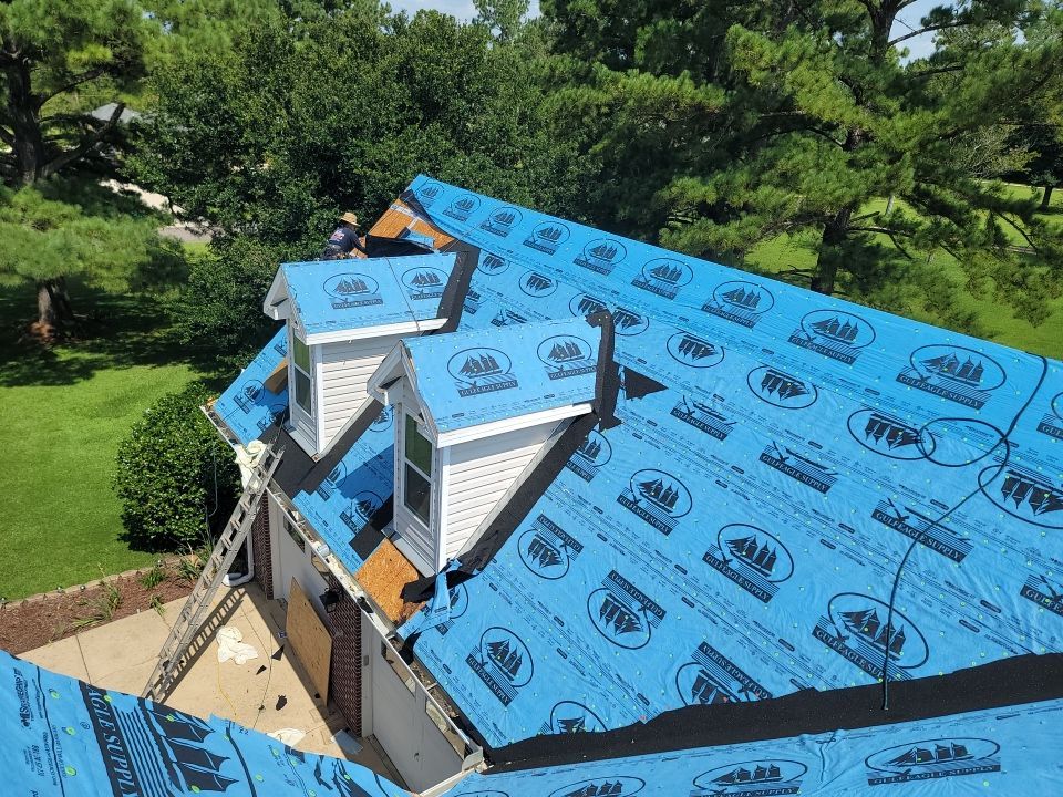 Residential Roofing Installation using Roof Replacement by American Roofing & Construction LLC
