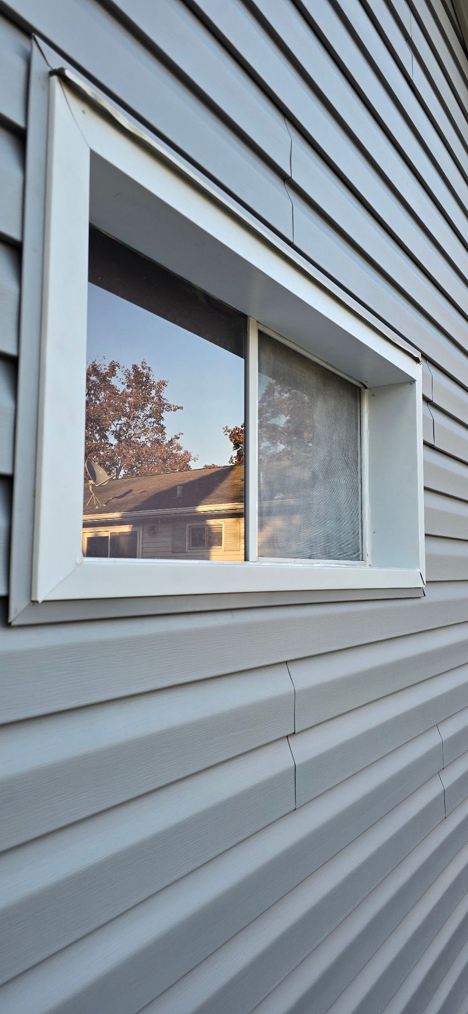 Siding Replacement with Vinyl Siding in Granite Gray by Gellings Roofing & Siding