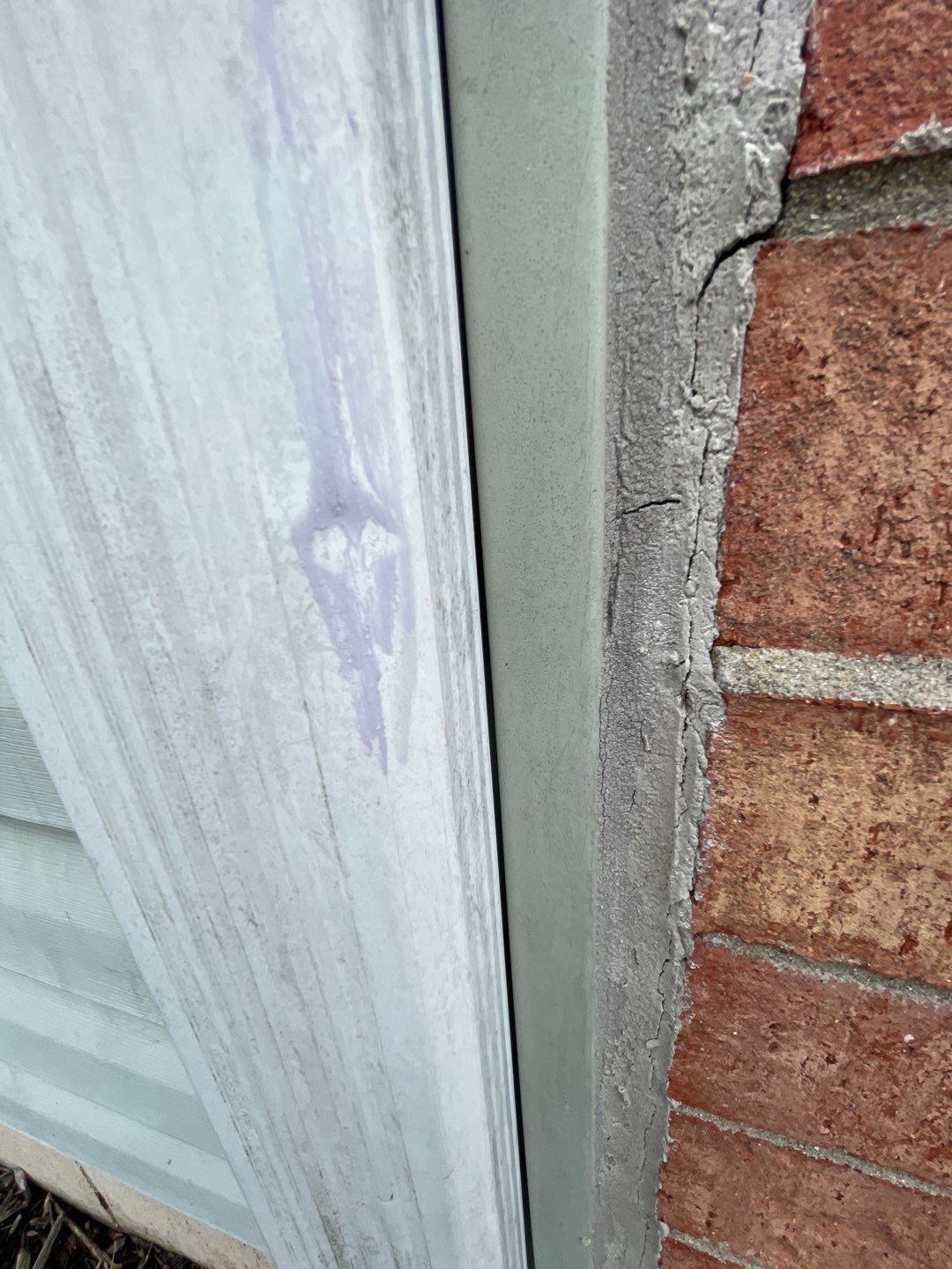 Exterior Installation using Onyx Black Durations and White Siding by WIW Enterprises Inc