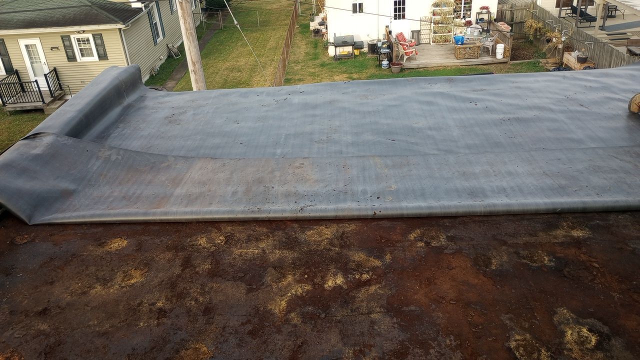 Commercial Roofing Installation using Performance Shingles by Mr. Roofer