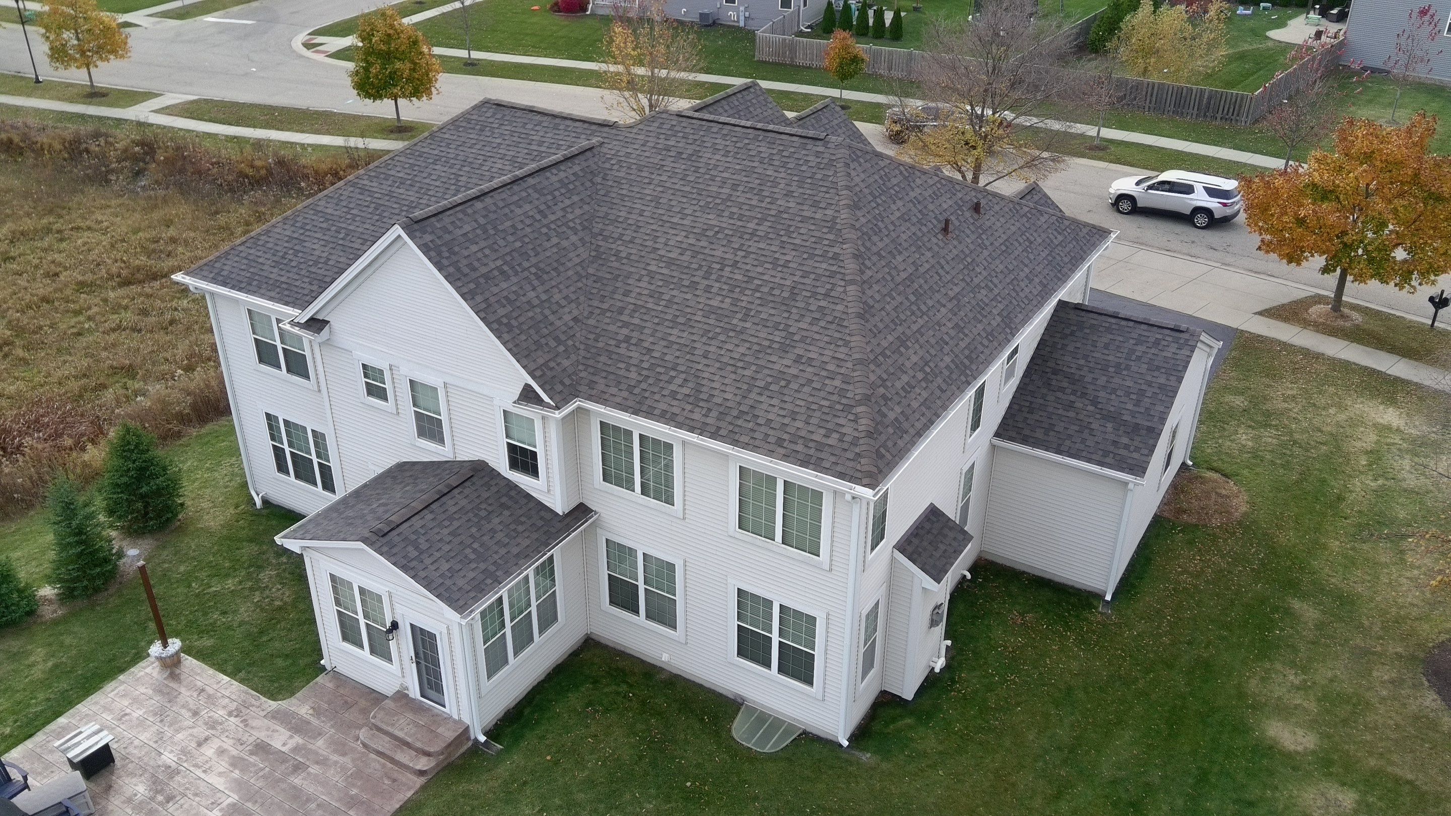 Re-roof: IKO Dynasty in DriftShake by Midwest Building Solutions